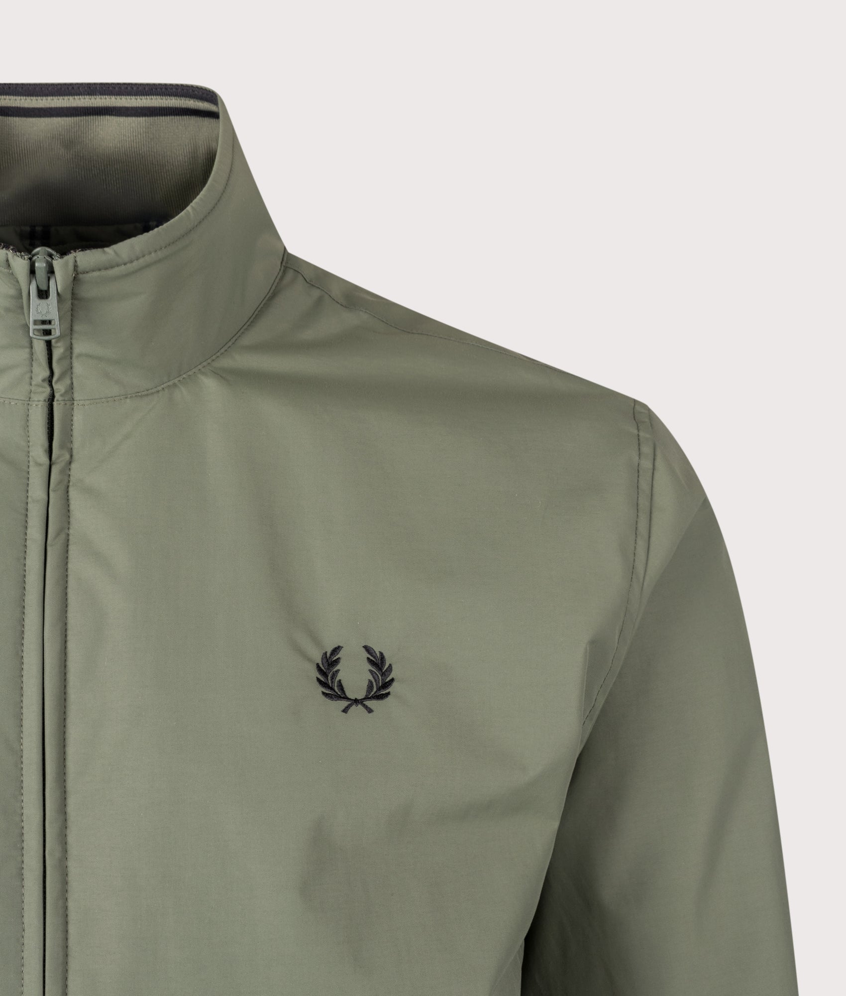 Fred Perry The Brentham Jacket in Laurel Wreath Green at EQVVS Menswear. Detail shot.
