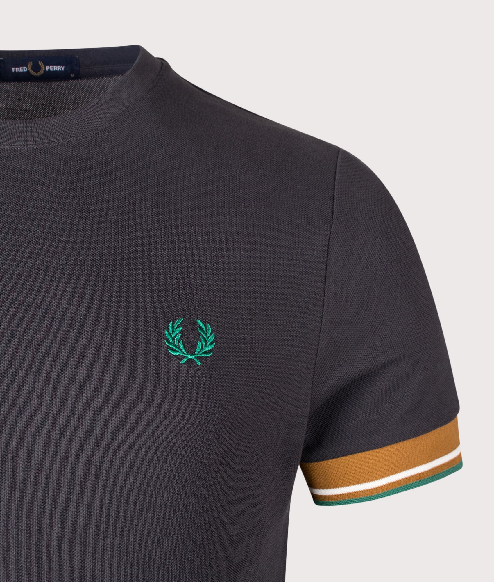 Fred Perry Twin Tipped Cuff T-Shirt in Anchor Grey at EQVVS Menswear. Detail shot.