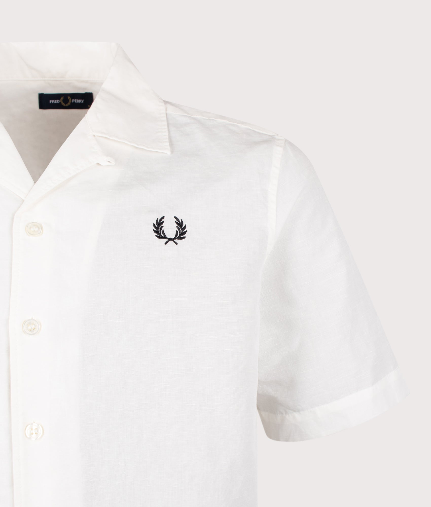 Fred Perry Relaxed Fit Linen Blend Revere Collar Shirt in Snow White at EQVVS Menswear. Detail shot.