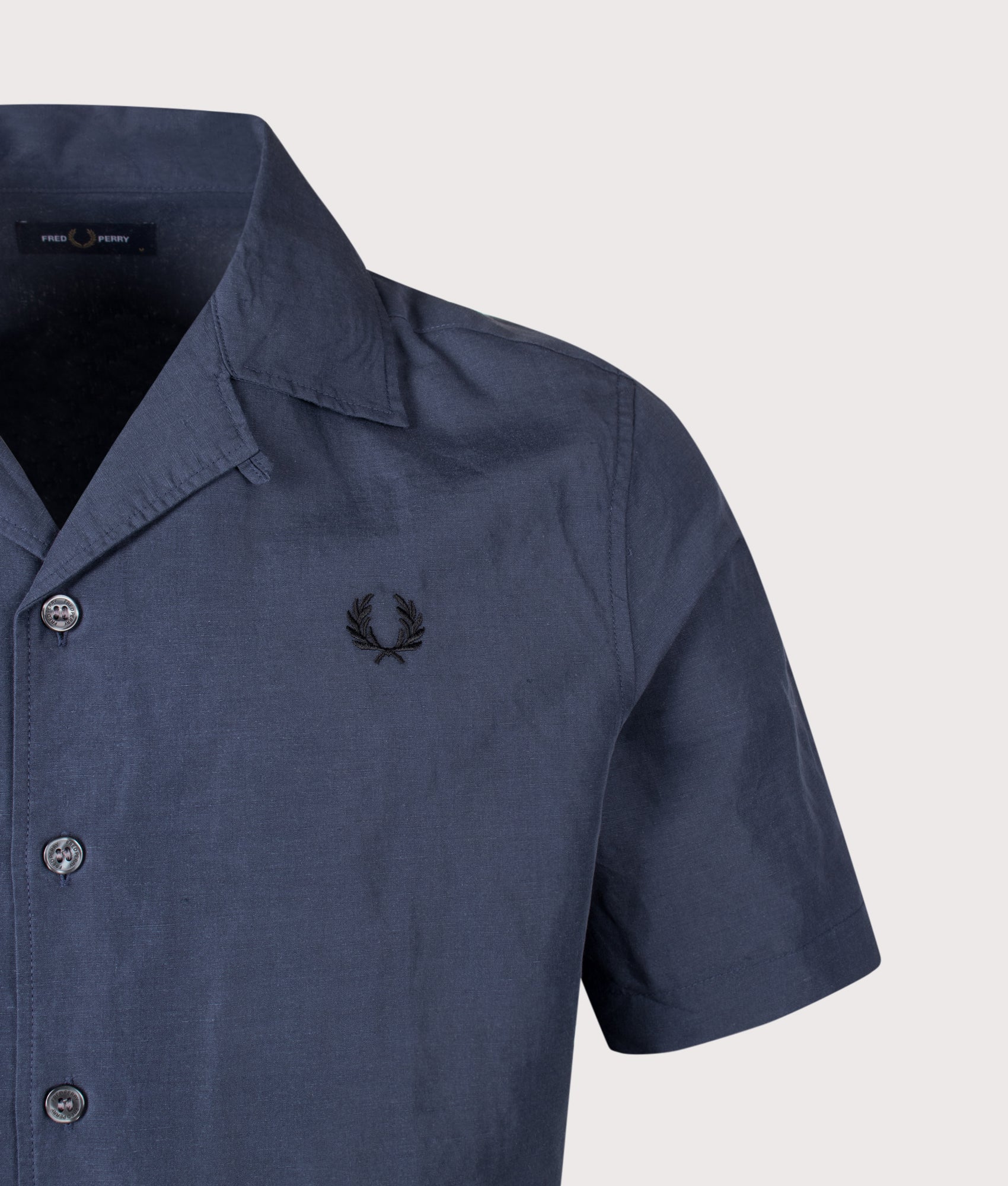 Fred Perry Relaxed Fit Linen Blend Revere Collar Shirt in Dark Airforce at EQVVS Menswear. Detail shot.