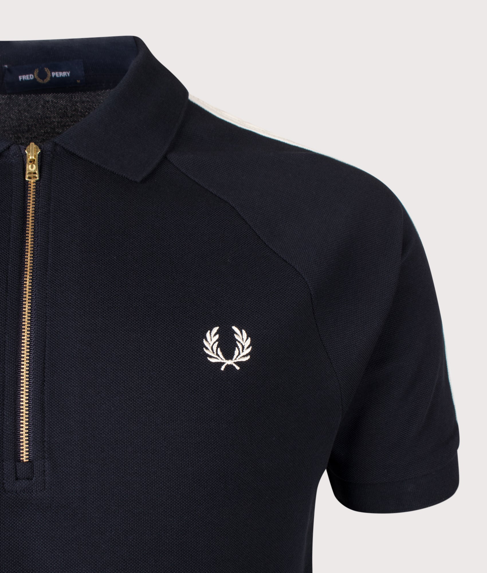 Fred Perry Cable Taped Polo Shirt in Navy at EQVVS Menswear. Second detail shot.