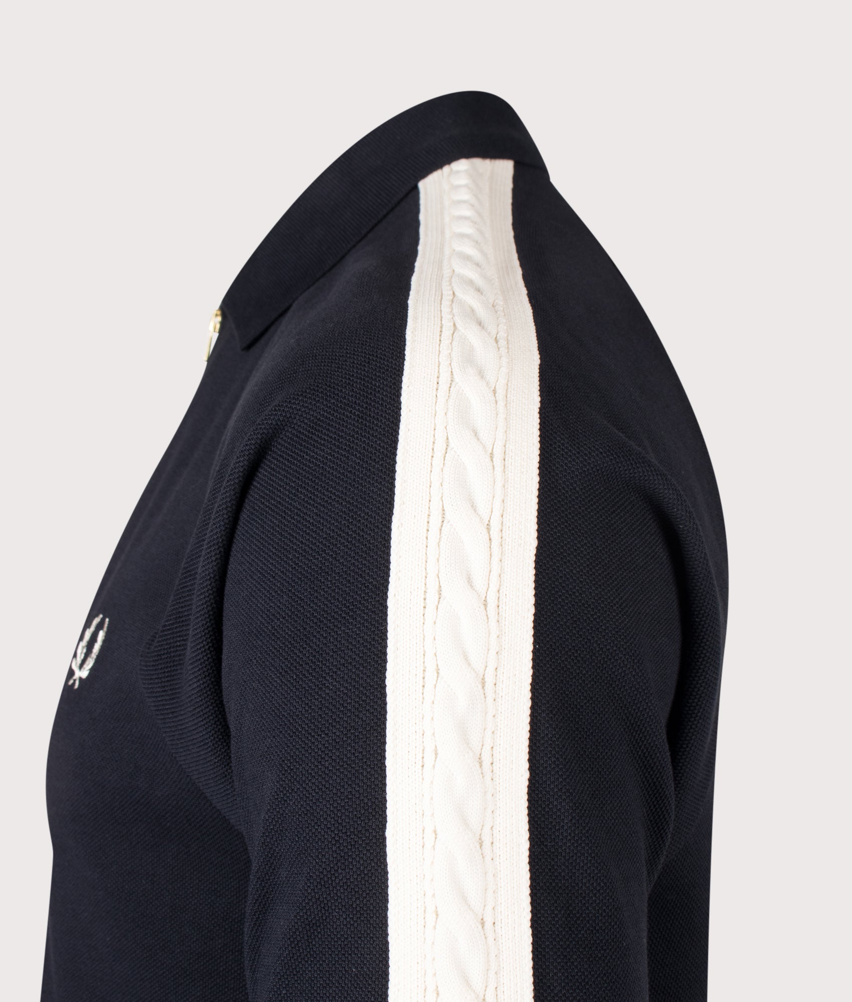 Fred Perry Cable Taped Polo Shirt in Navy at EQVVS Menswear. Side detail shot.