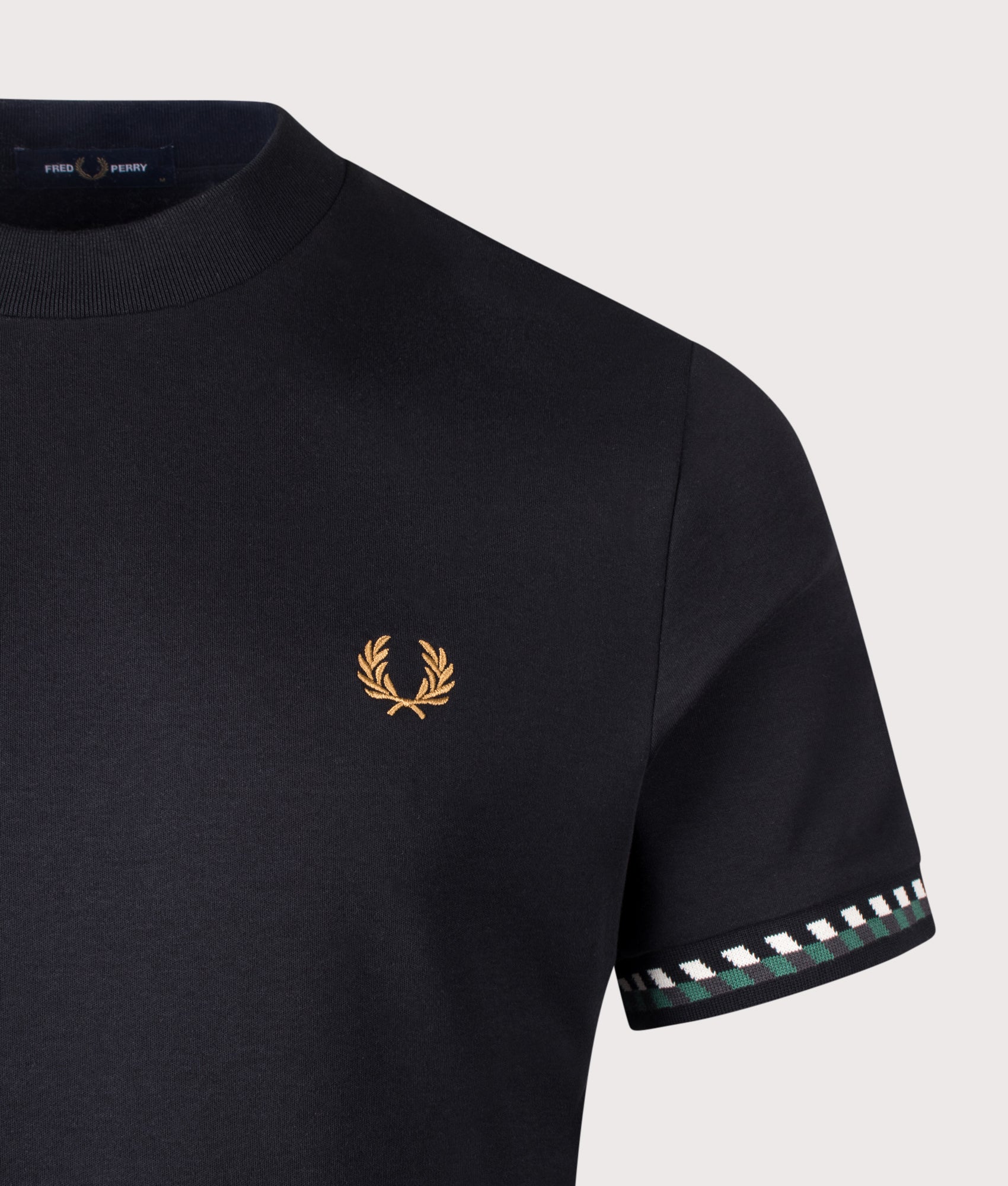 Fred Perry Jacquard Cuff T-Shirt in  Black at EQVVS Menswear. Detail shot.