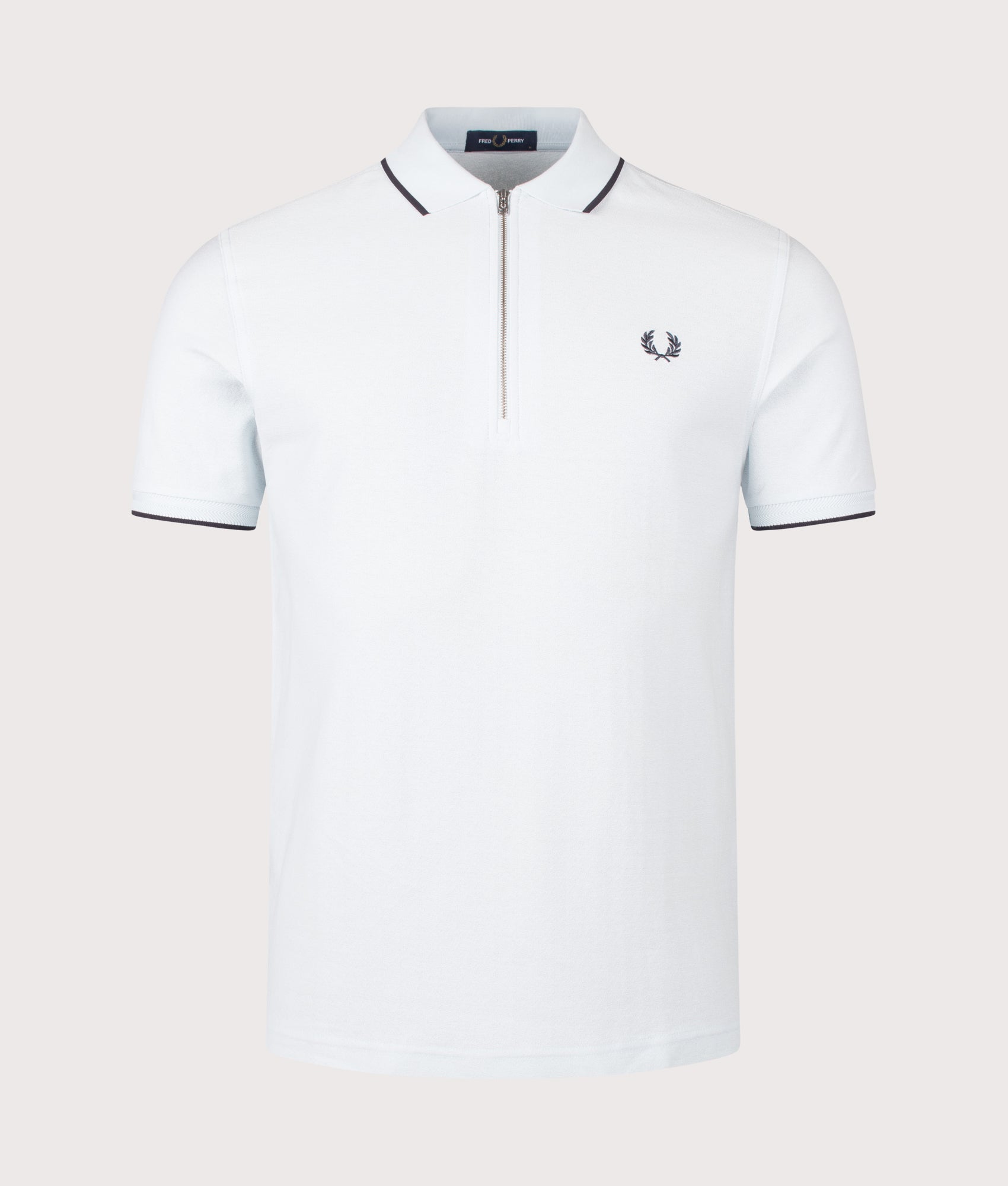 Fred Perry Crepe Piqué Polo Shirt in Light Ice at EQVVS Menswear. Front shot.