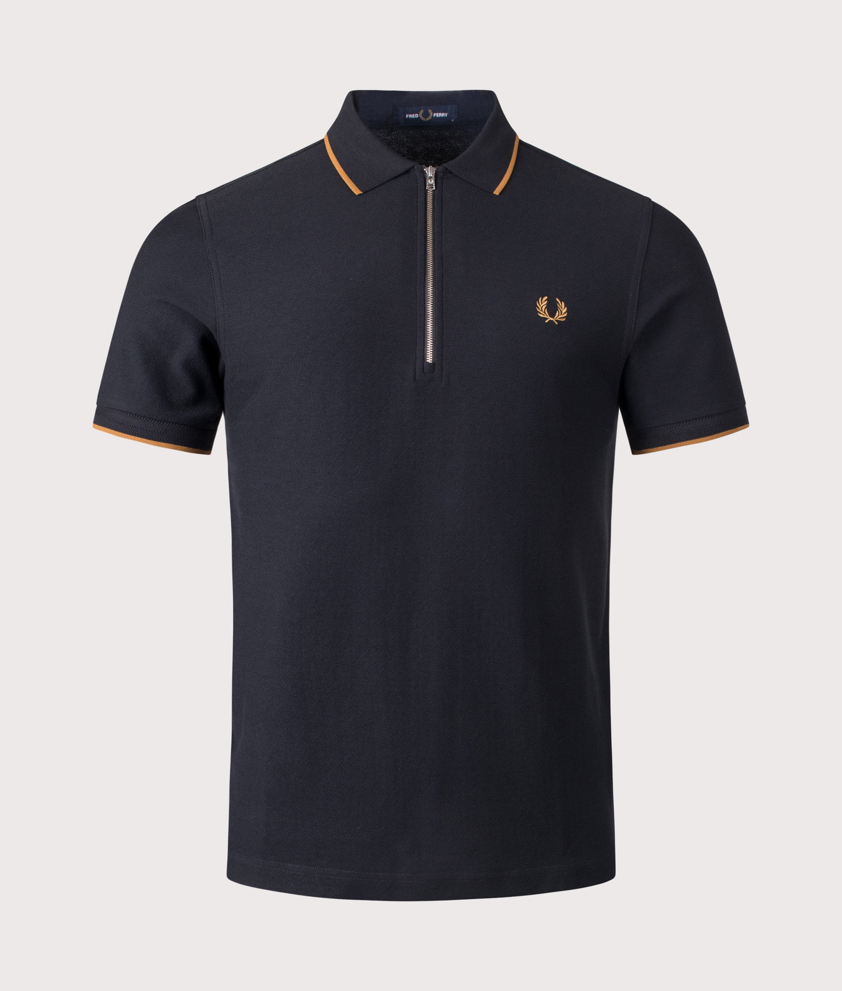 Fred Perry Crepe Piqué Polo Shirt in Black at EQVVS Menswear. Front shot.