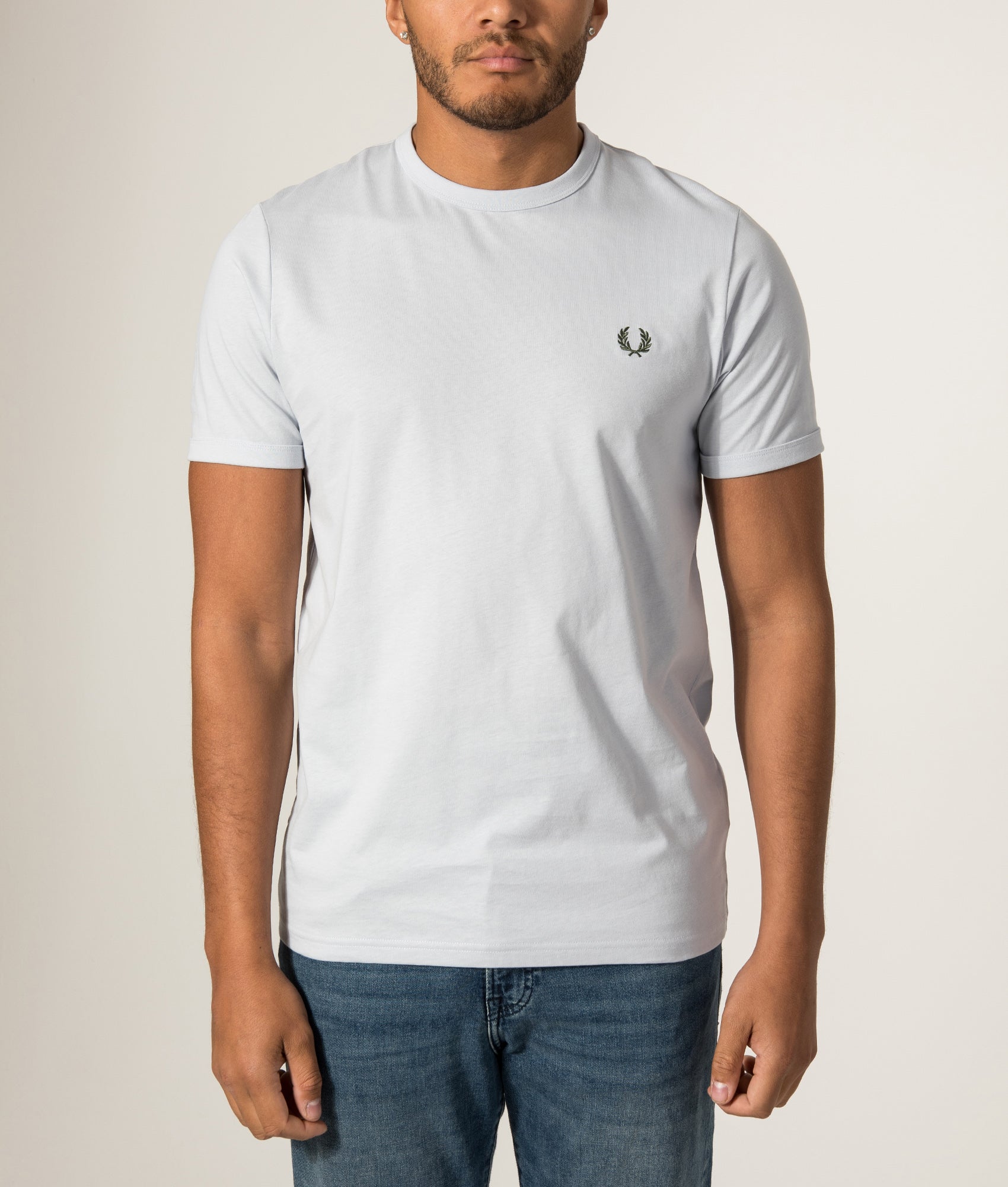 Fred Perry Ringer T-Shirt in Dusky Blue at EQVVS Menswear. Model front shot.