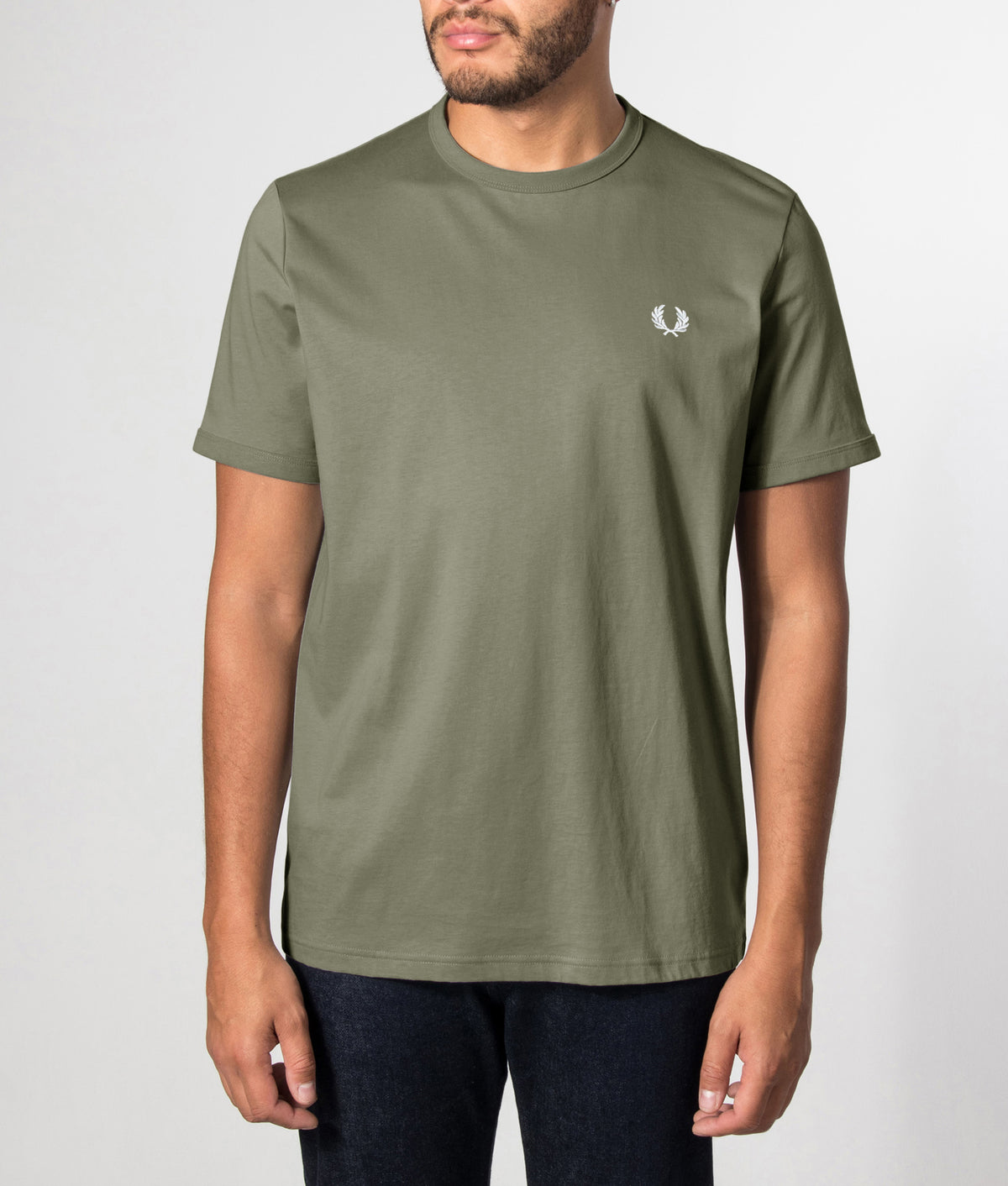 Fred Perry Ringer T-Shirt in Laurel Wreath Green at EQVVS Menswear. Front model shot.