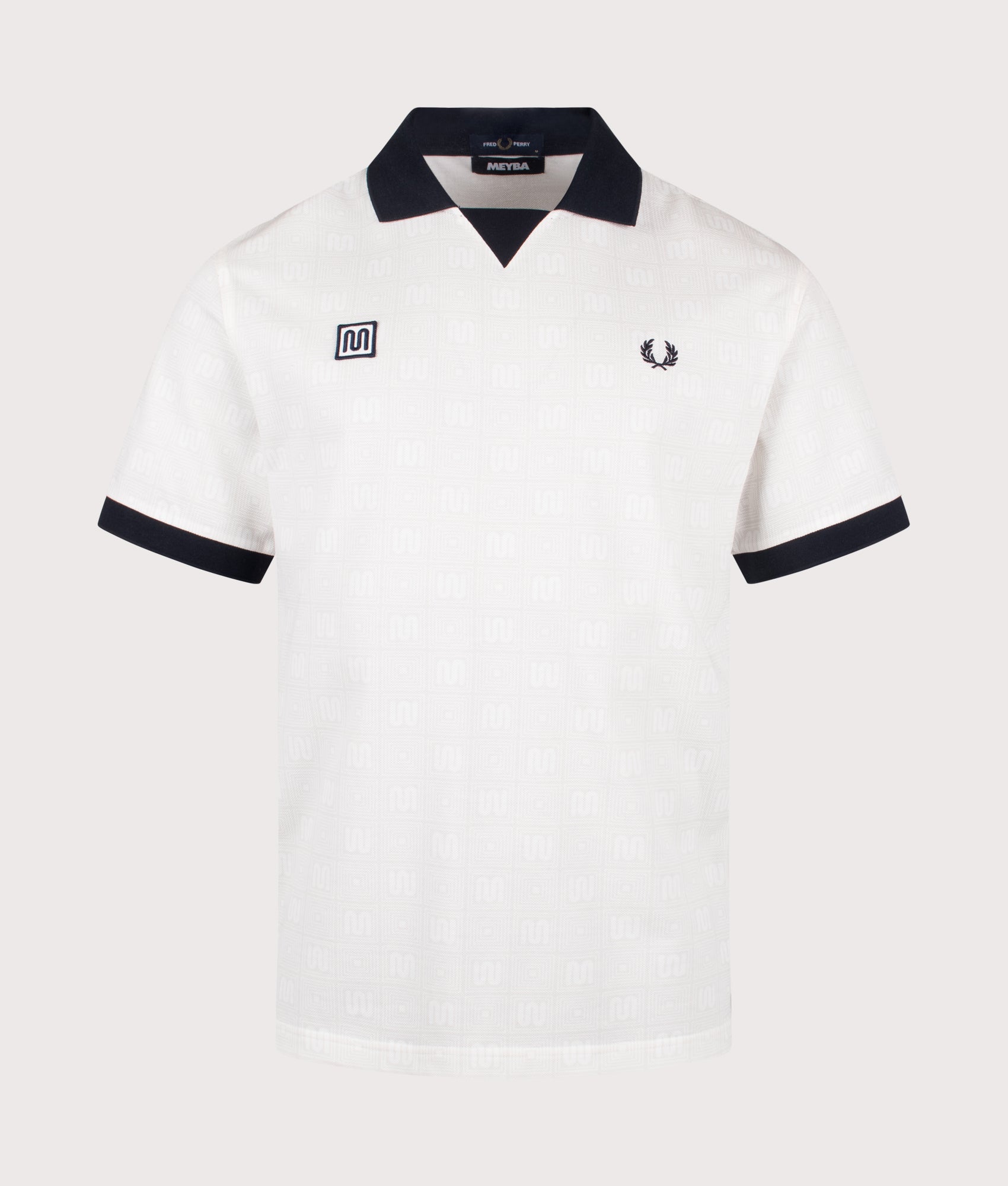 Meyba Printed Polo Shirt in Ecru by Fred Perry. Shot by EQVVS. Front shot.