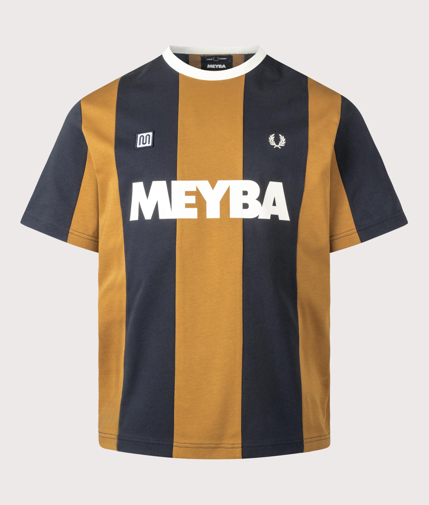 Fred Perry x Meyba Relaxed Fit Cut And Sew T-Shirt in Dark Caramel at EQVVS Menswear. Front shot.