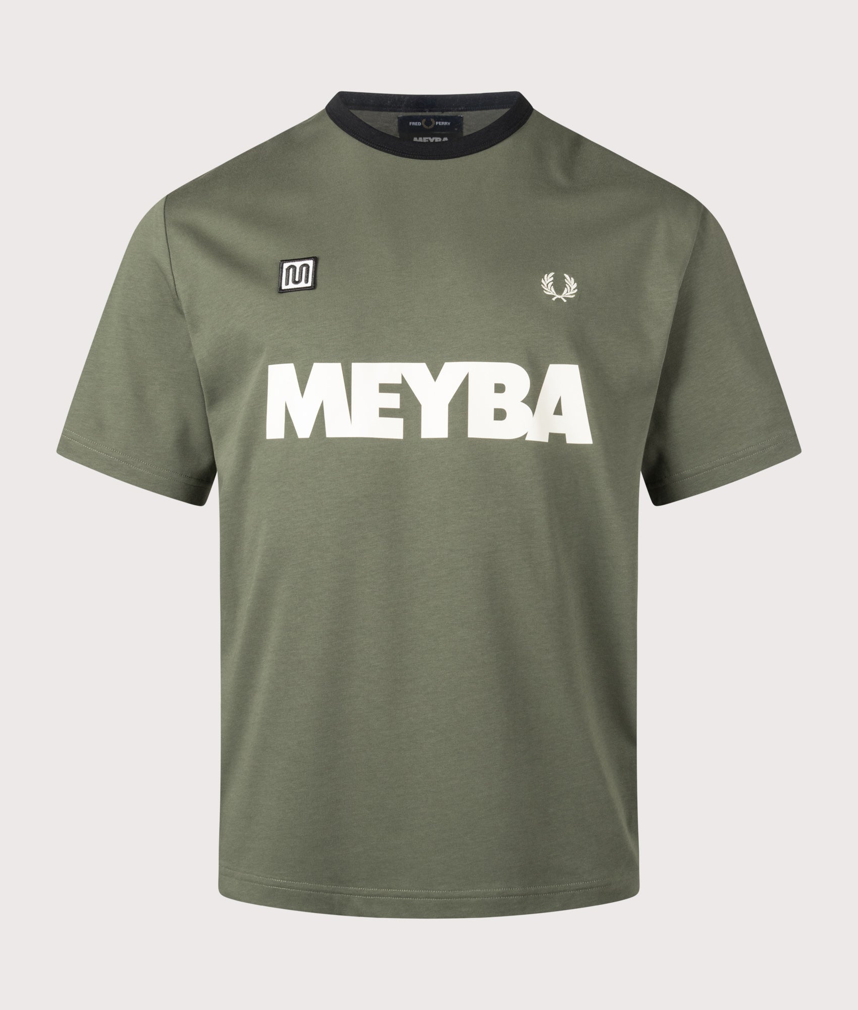 Meyba Ringer T-Shirt in Laurel Wreath Green by Fred Perry. Shot by EQVVS. Front shot.