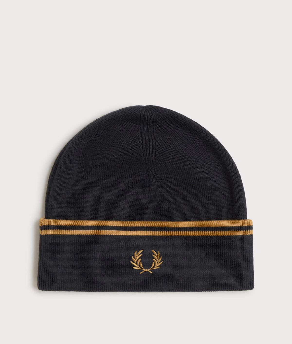 Fred Perry Twin Tipped Merino Wool Beanie in Black and Dark Caramel at EQVVS Menswear. Front shot.