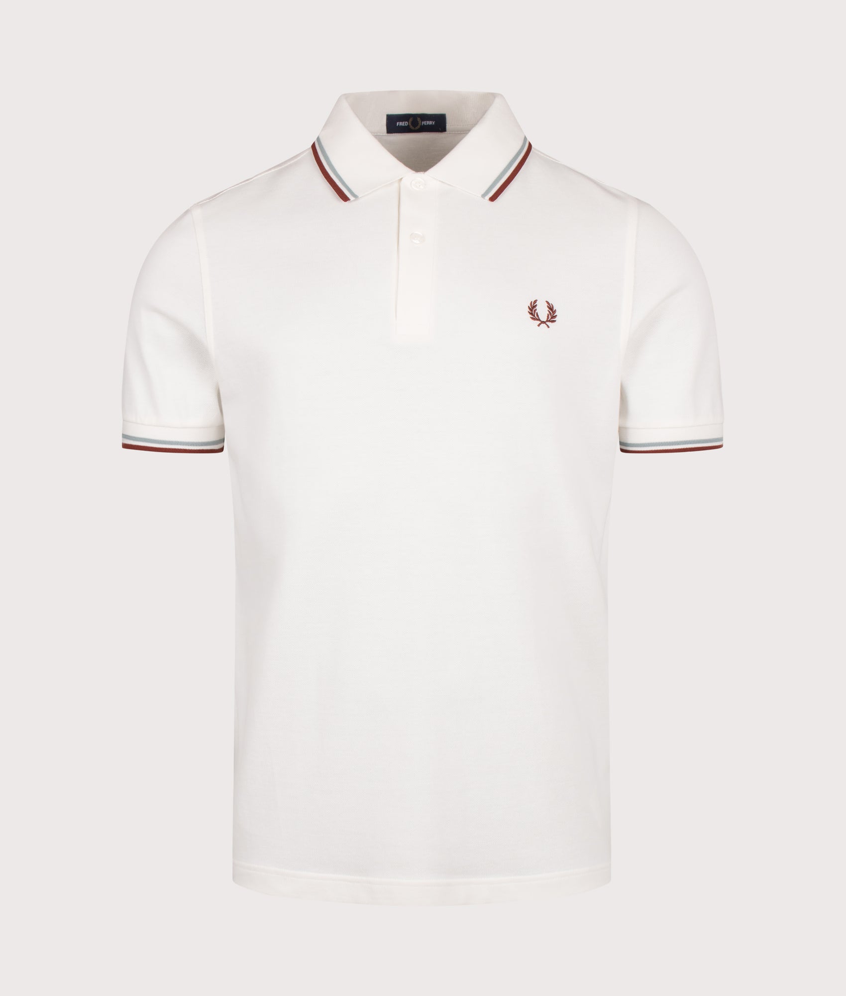 Fred Perry Twin Tipped Polo Shirt in  Snow White, Silver Blue and Brandy at EQVVS Menswear. Front shot.