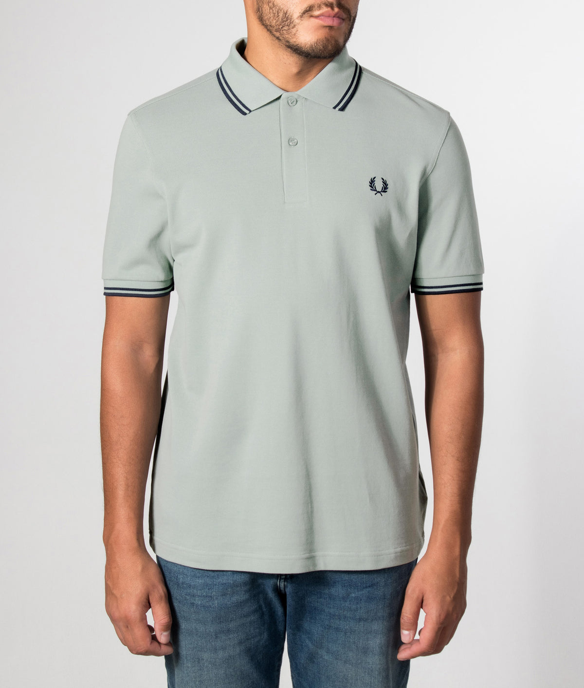 Fred Perry Twin Tipped Polo Shirt in Silver Blue and Dark Airforce at EQVVS Menswear. Model front shot.