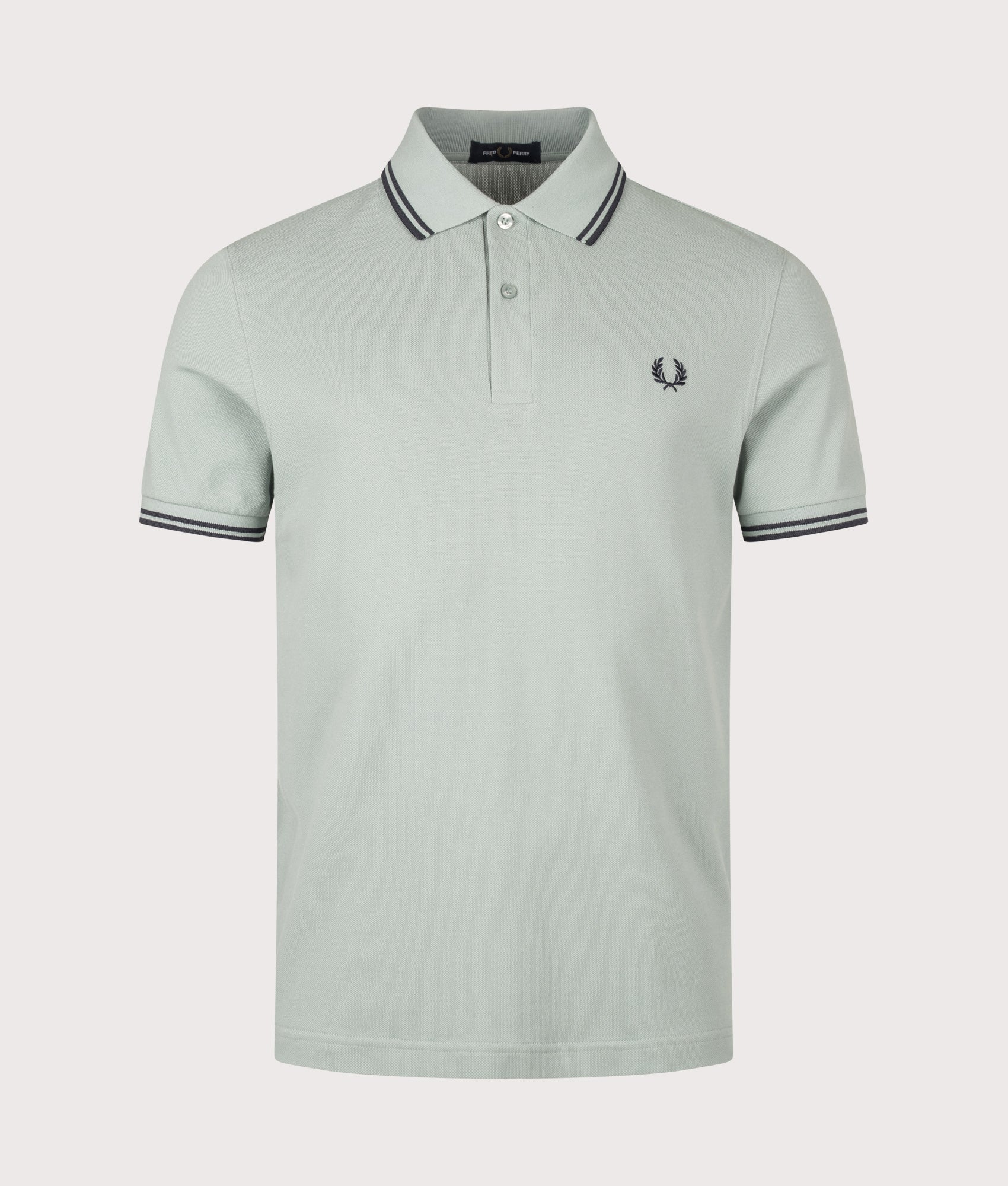 Fred Perry Twin Tipped Polo Shirt in Silver Blue and Dark Airforce at EQVVS Menswear. Front shot.