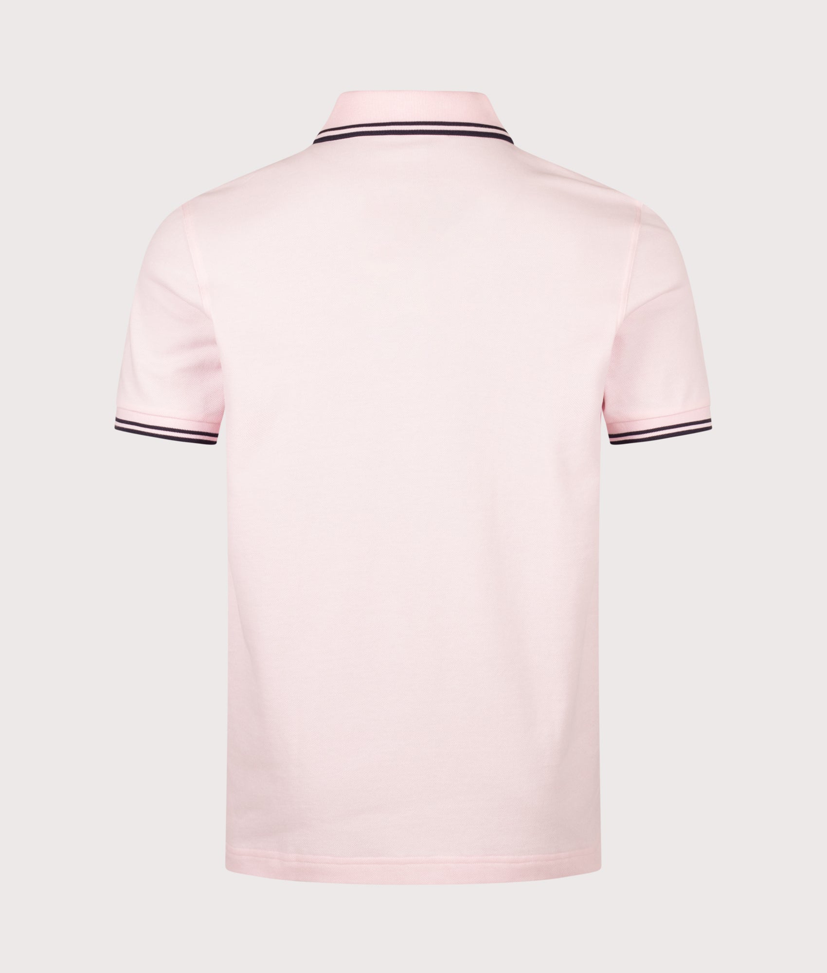 Fred Perry Twin Tipped Polo Shirt in Iced Pink and Navy at EQVVS Menswear. Back shot.