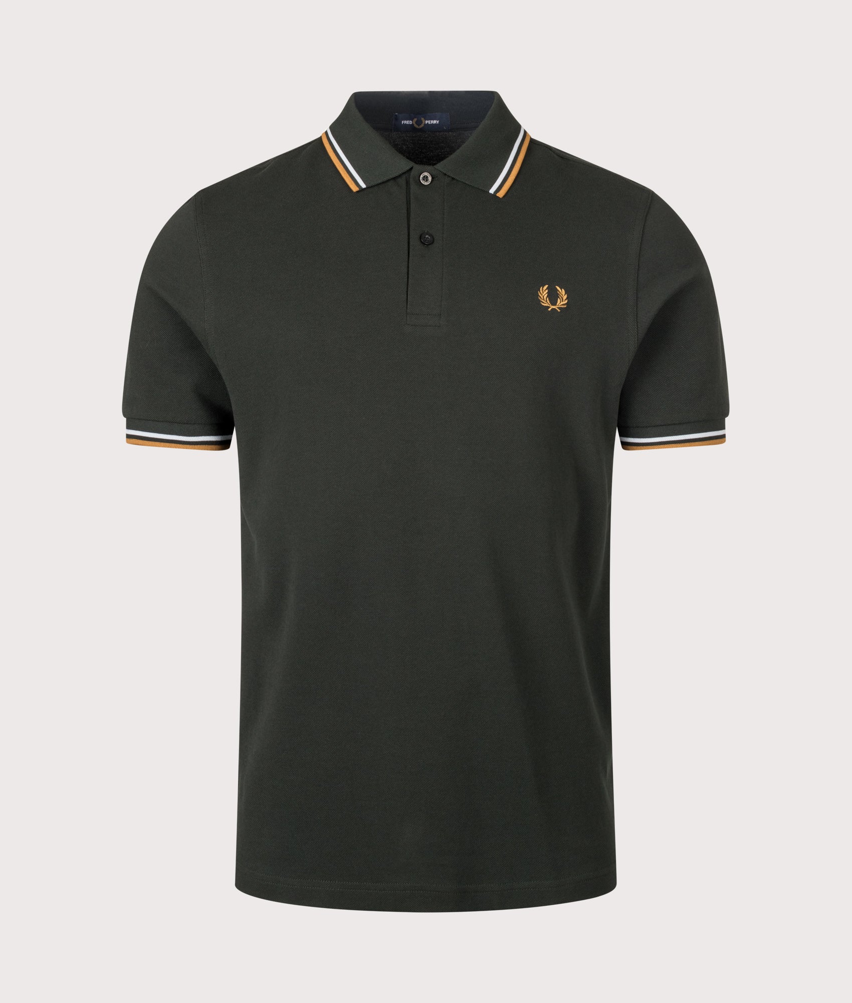 Fred Perry Twin Tipped Polo Shirt in Night Green, Dusky Blue and Dark Caramel at EQVVS Menswear. Front shot.