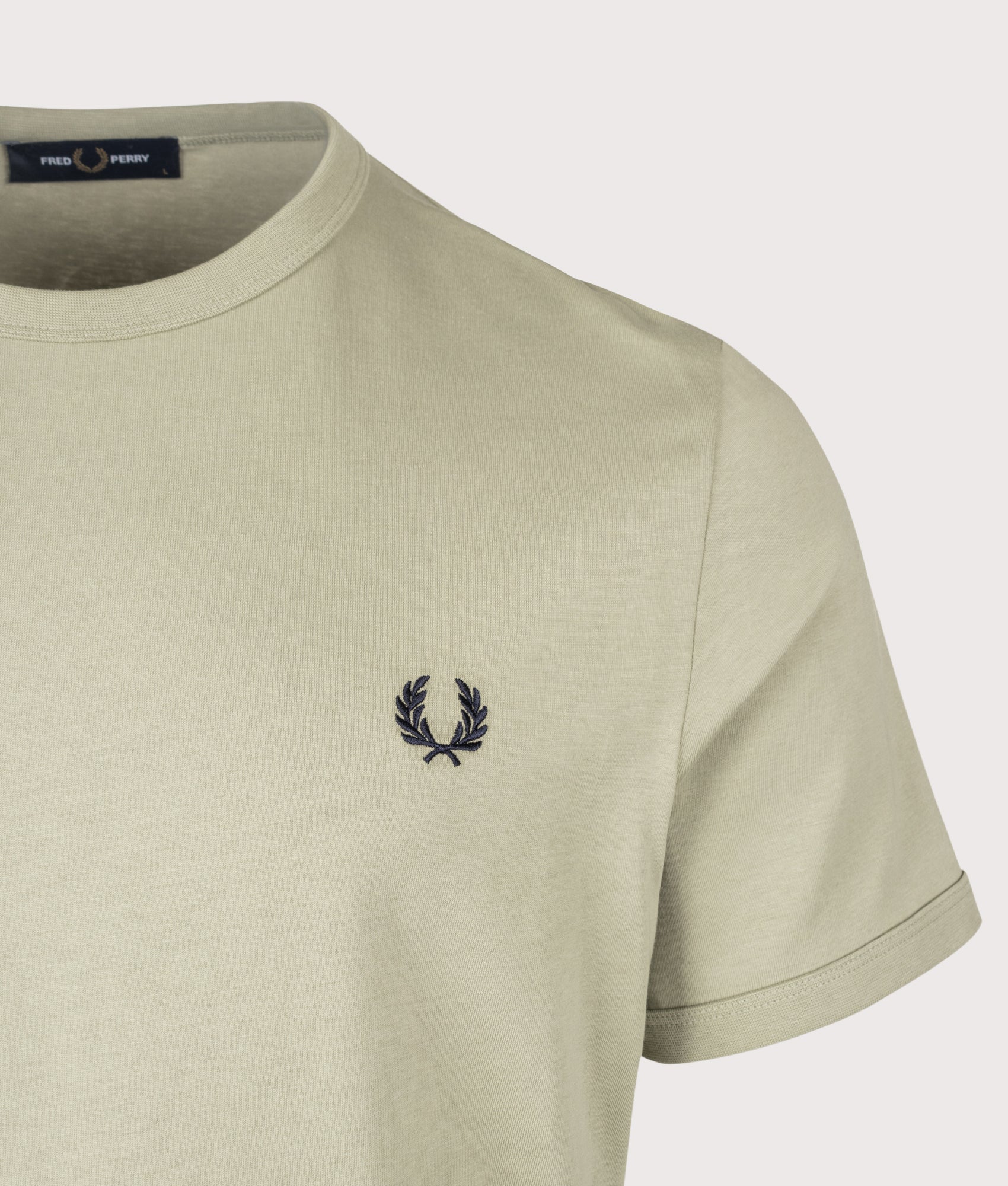 Fred Perry Regular Fit Ringer T-Shirt in Seagrass at EQVVS Menswear. Detail shot.