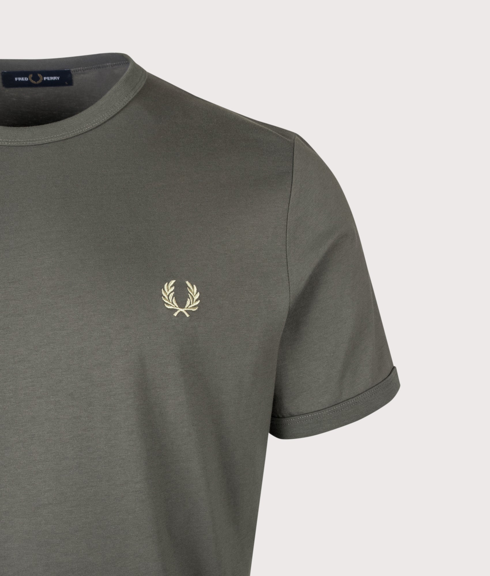 Fred Perry Regular Fit Ringer T-Shirt in Field Green at EQVVS Menswear. Detail shot.