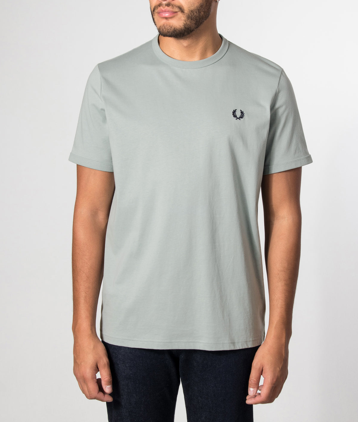 Fred Perry Regular Fit Ringer T-Shirt in Silver Blue at EQVVS Menswear. Model front shot.