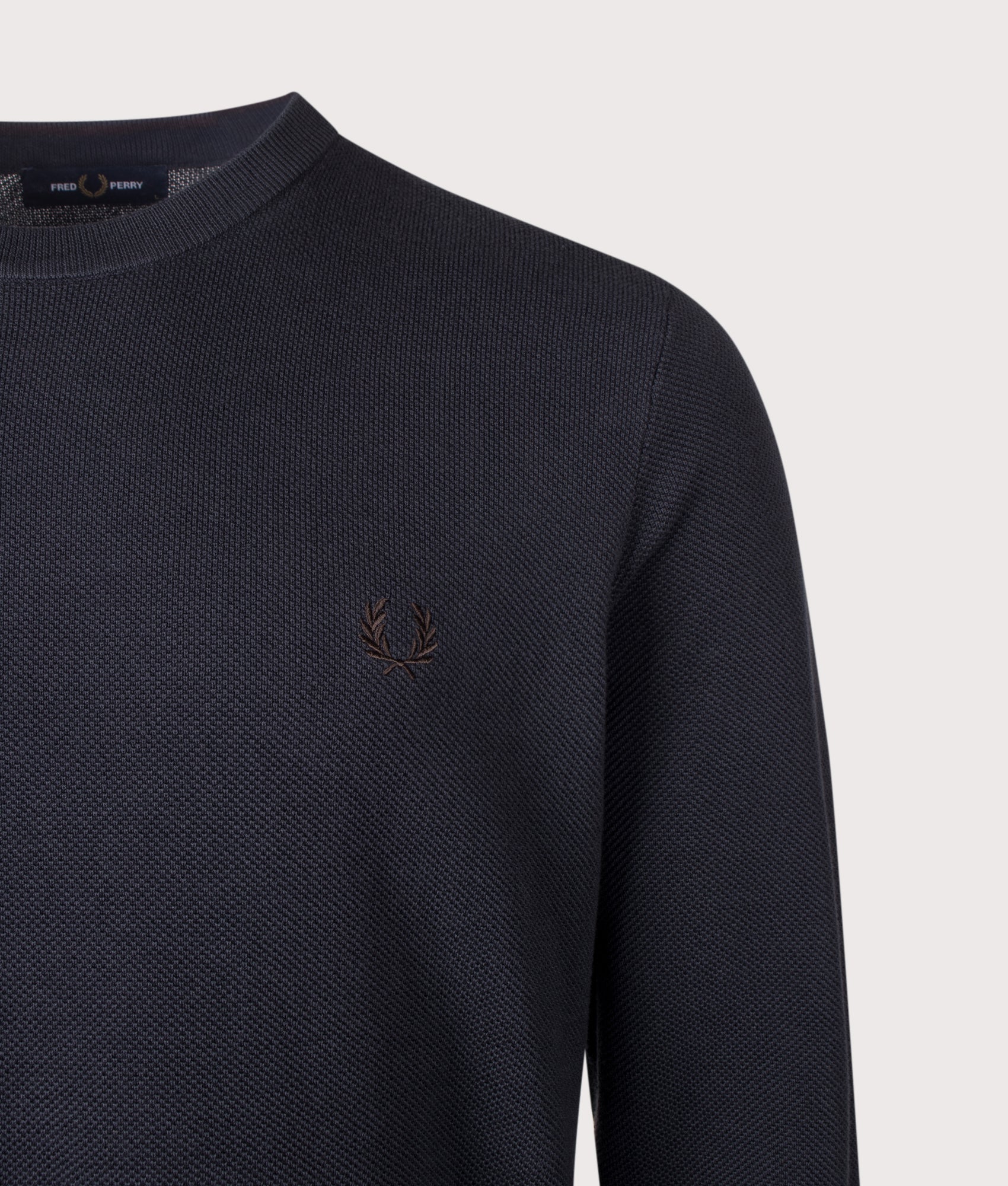 Fred Perry Regular Fit Piqué Stitch Jumper in Navy at EQVVS Menswear. Detail shot.