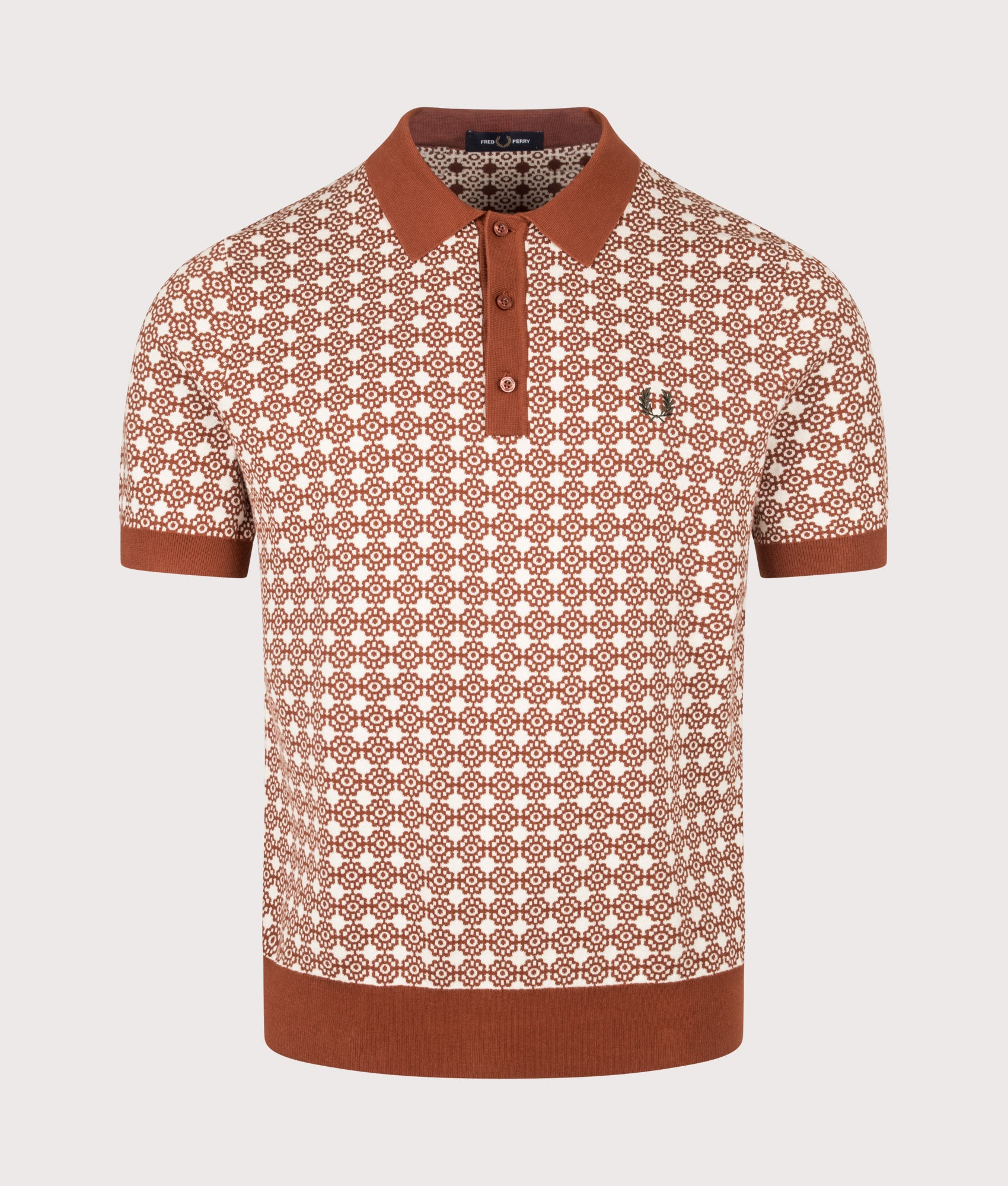 Fred Perry Regular Fit Floral Jacquard Polo Shirt in Brandy at EQVVS Menswear. Front shot.