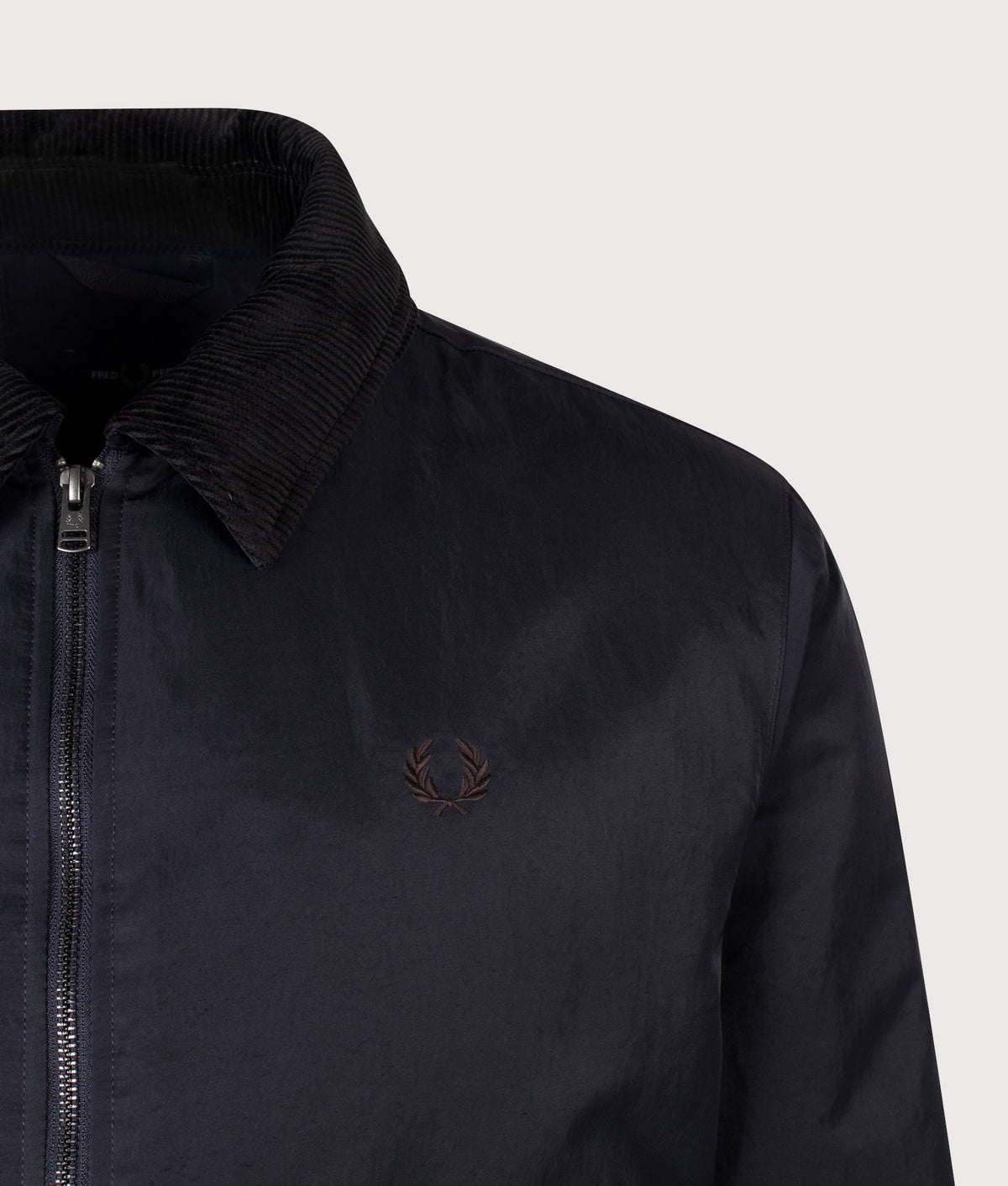 Fred Perry Regular Fit Nylon Caban Jacket in Navy at EQVVS Menswear. Detail shot.