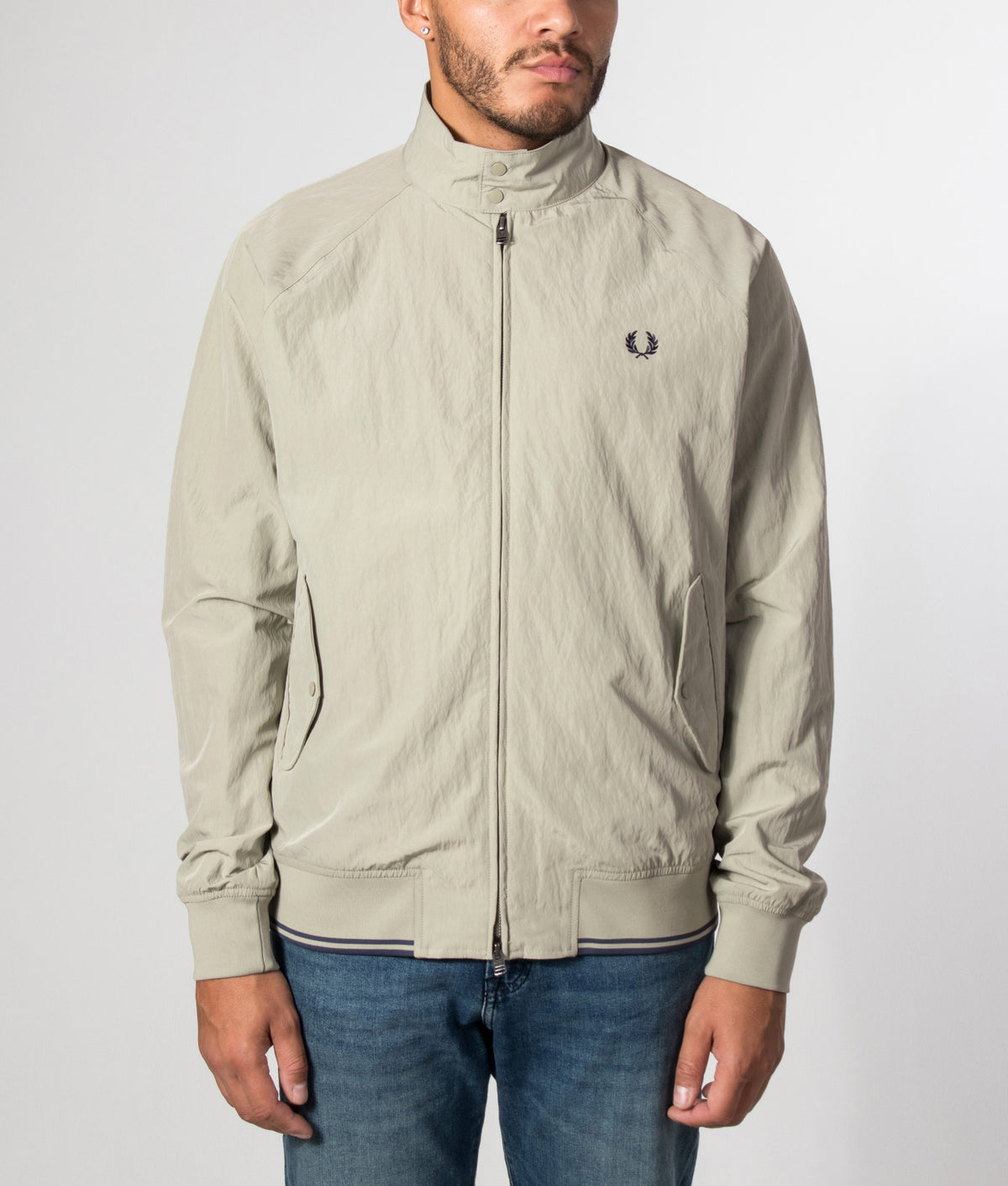 Fred Perry Regular Fit Crinkle Nylon Harrington Jacket in Seagrass at EQVVS Menswear. Model front shot.
