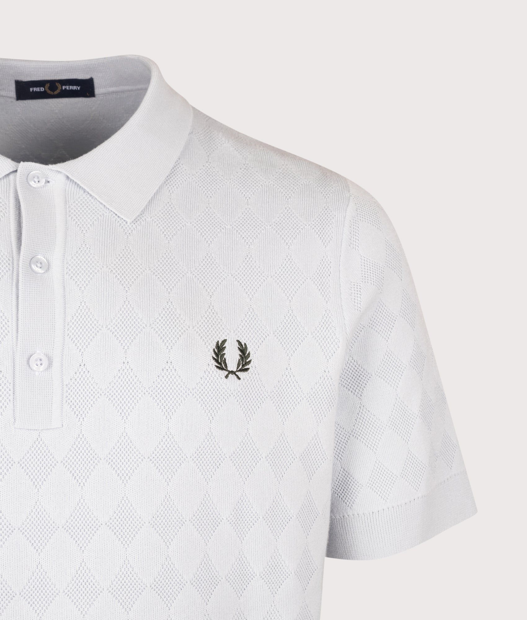 Fred Perry Regular Fit Pointelle Knitted Polo Shirt in Dusky Blue at EQVVS Menswear. Detail shot.