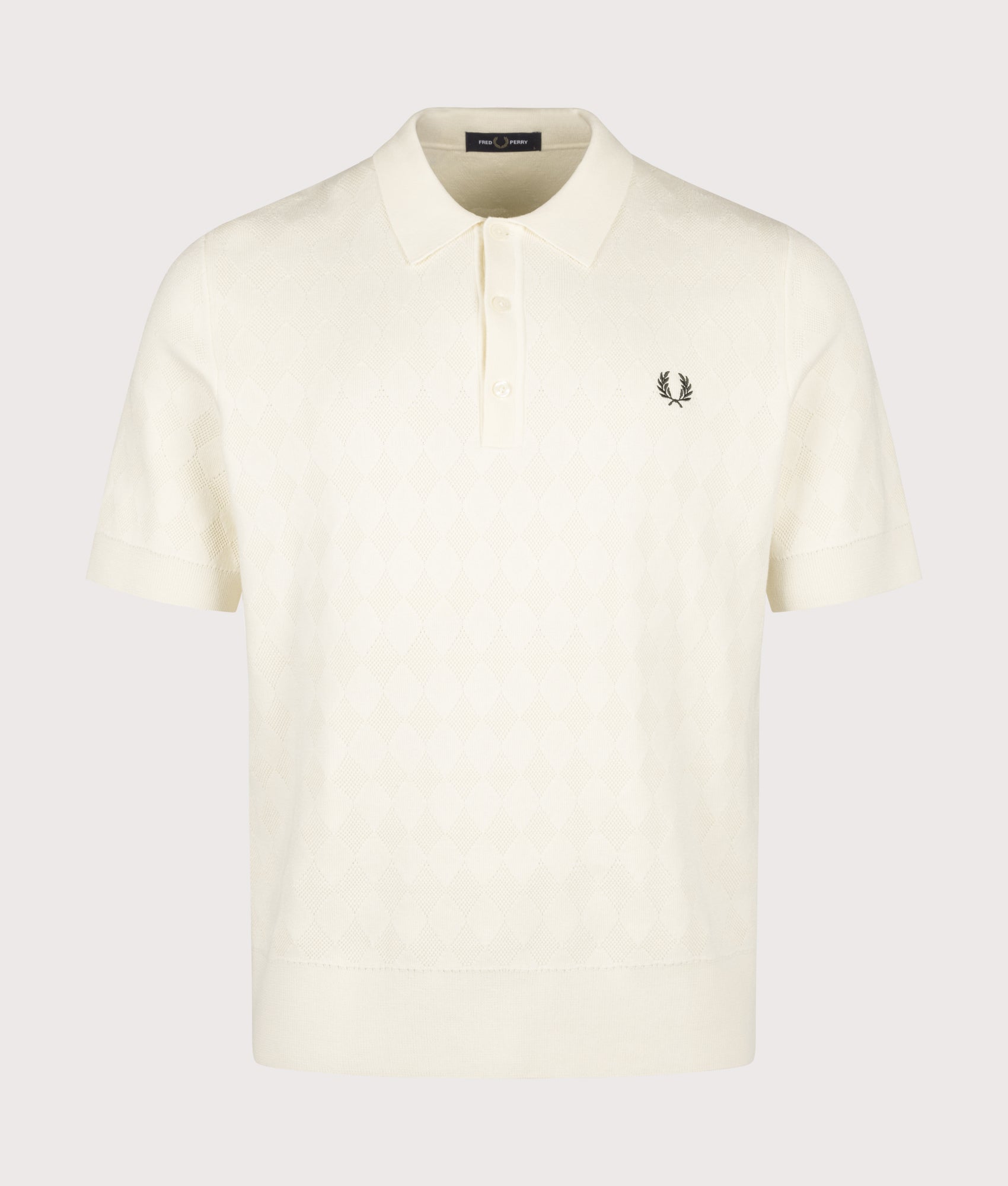 Fred Perry Regular Fit Pointelle Knitted Polo Shirt in Ecru at EQVVS menswear. Front shot.