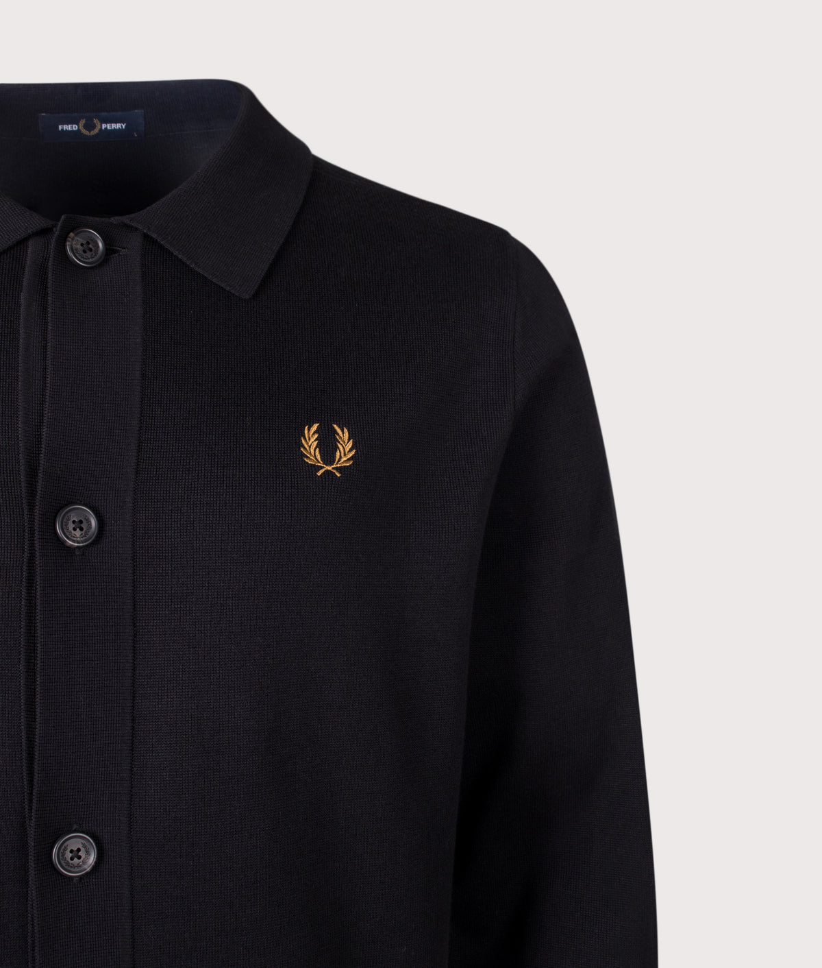 Fred Perry Regular Fit Knitted Overshirt in Black at EQVVS Menswear. Detail shot.