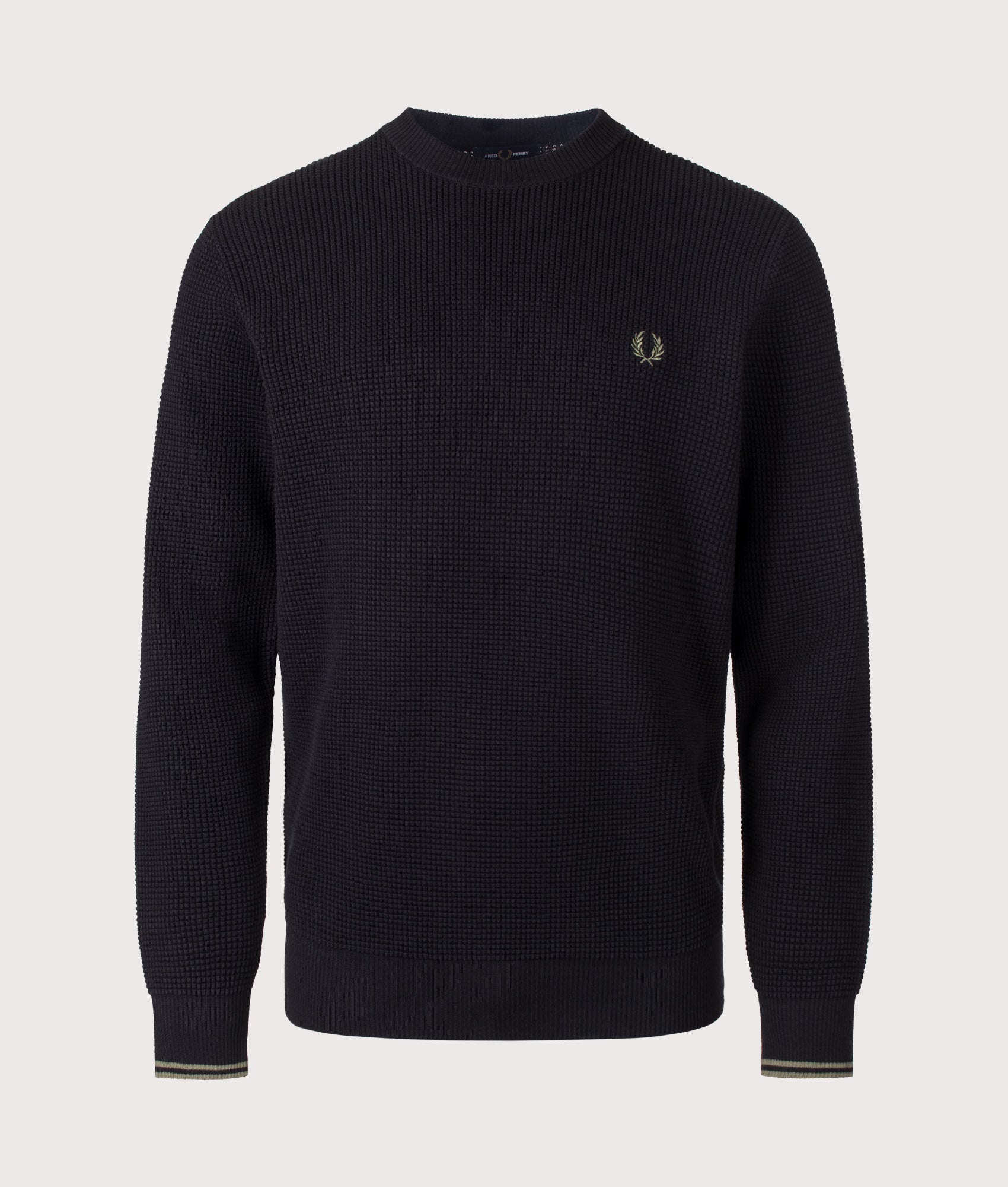 Fred Perry Regular Fit Waffle Stitch Jumper in Black at EQVVS Menswear. Front shot.