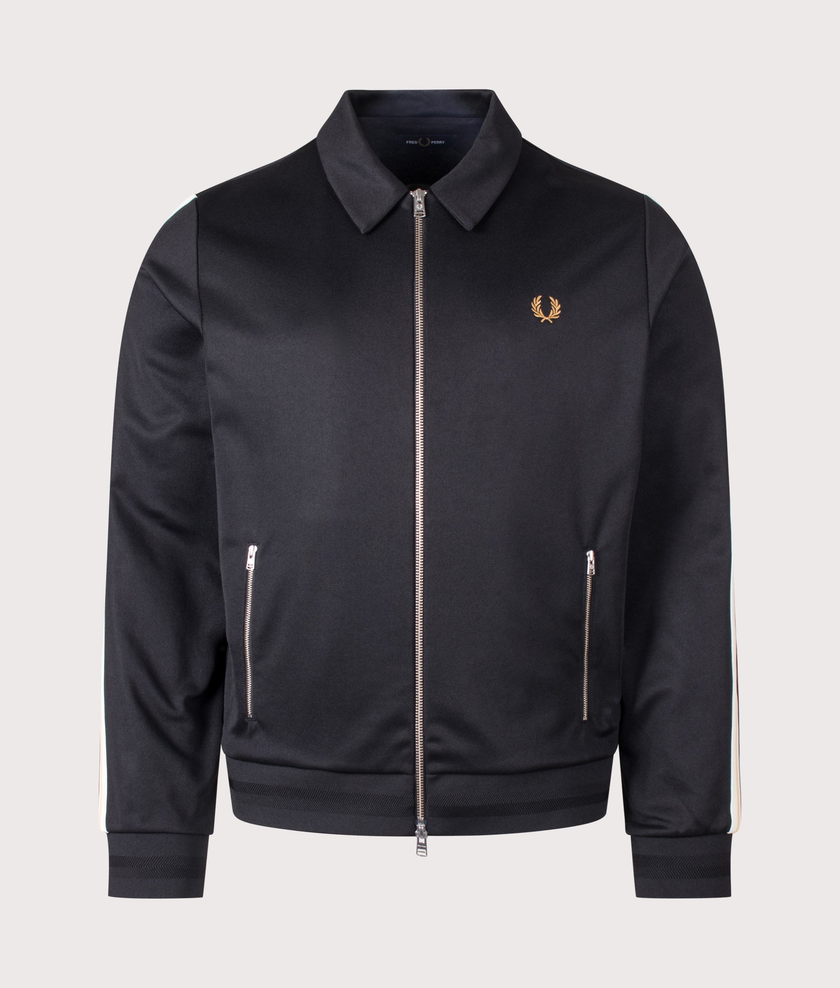 Fred Perry Regular Fit Tipped Tape Track Jacket in Black at EQVVS Menswear. Front shot.