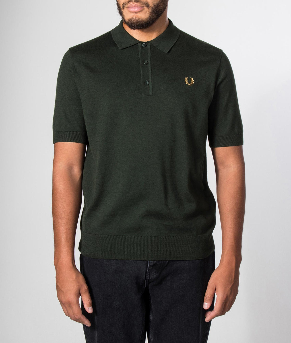 Fred Perry Long Staple Cotton Knitted Polo Shirt in Night Green at EQVVS Menswear. Model front shot.