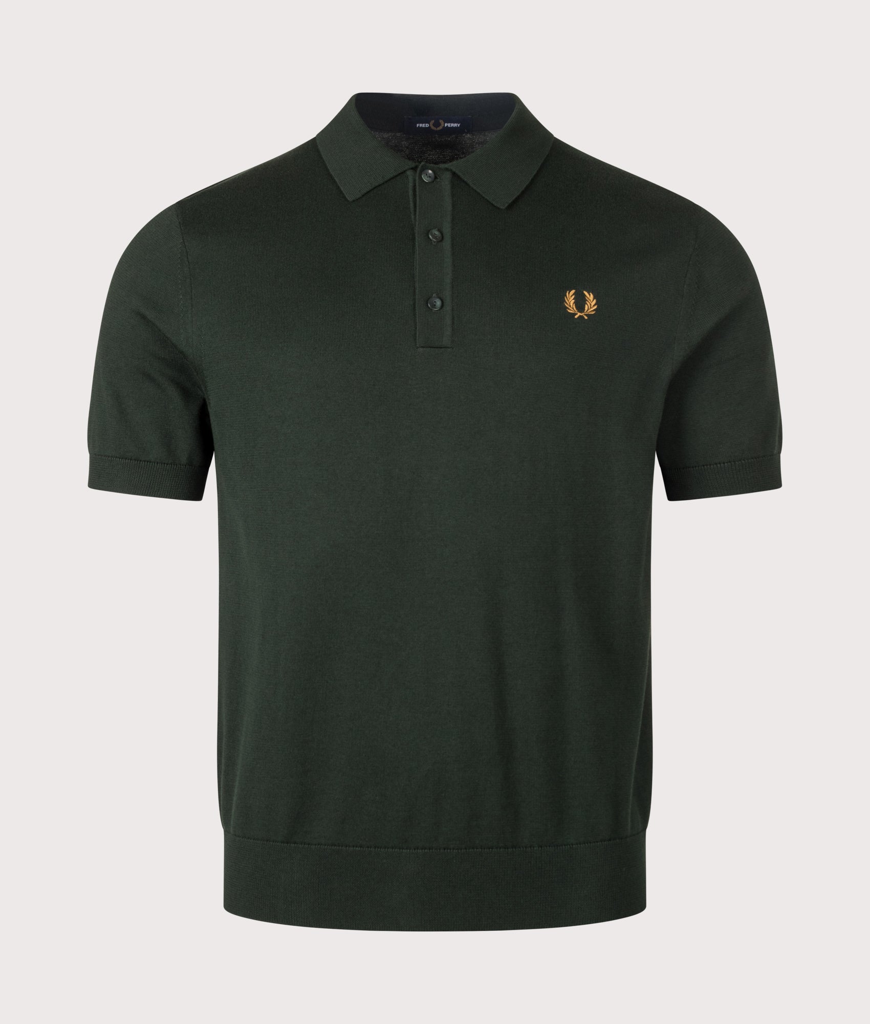 Fred Perry Long Staple Cotton Knitted Polo Shirt in Night Green at EQVVS Menswear. Front shot.