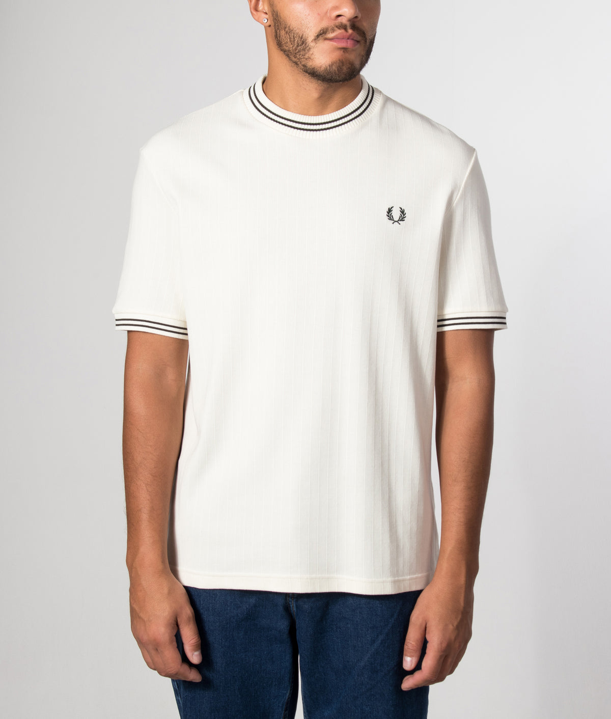 Fred Perry Regular Fit Ribbed Jersey T-Shirt in Ecru at EQVVS Menswear. Model front shot.