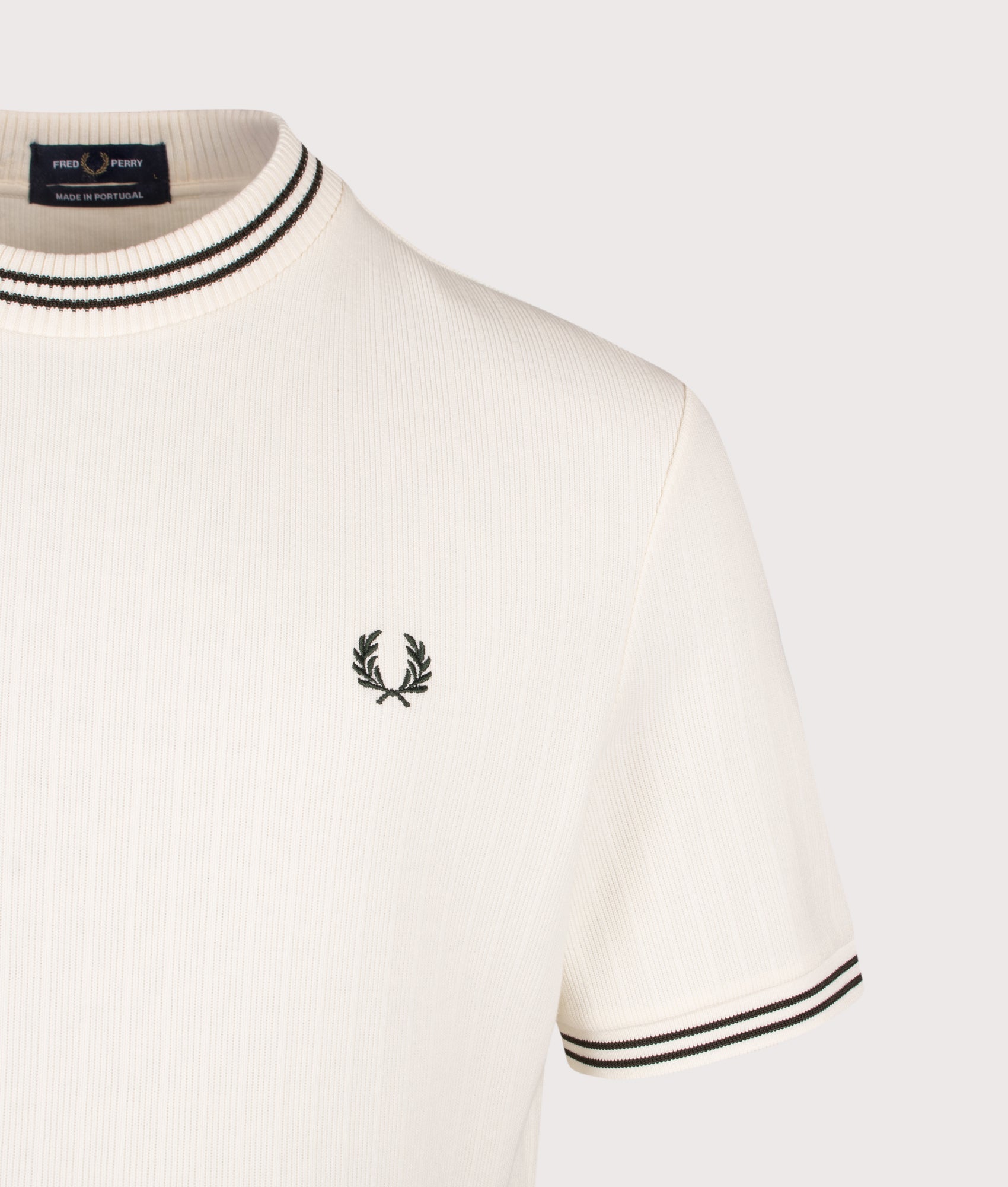Fred Perry Regular Fit Ribbed Jersey T-Shirt in Ecru at EQVVS Menswear. Detail shot.