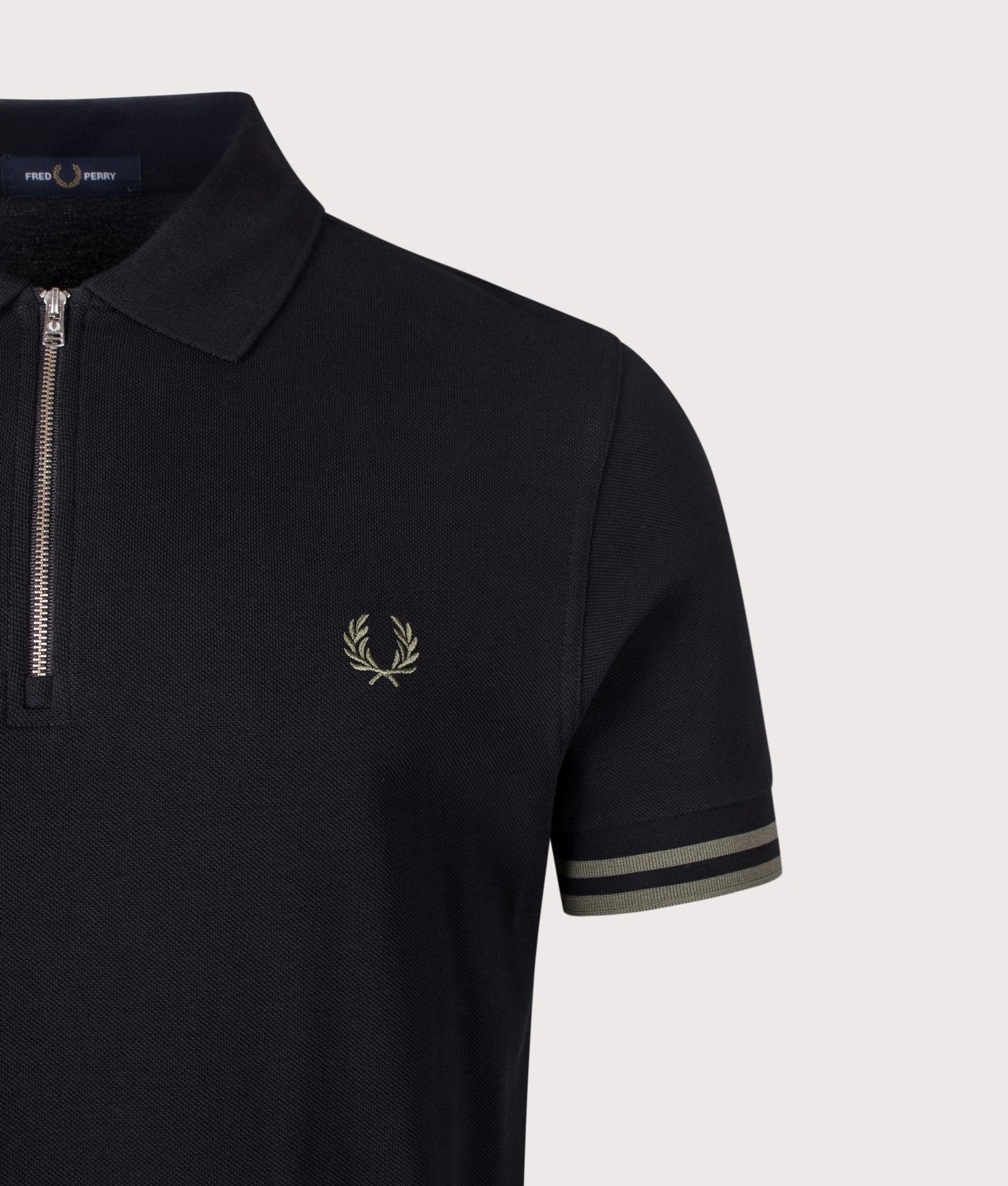 Fred Perry Regular Fit Bold Tipped Polo Shirt in Black at EQVVS Menswear. Detail shot.
