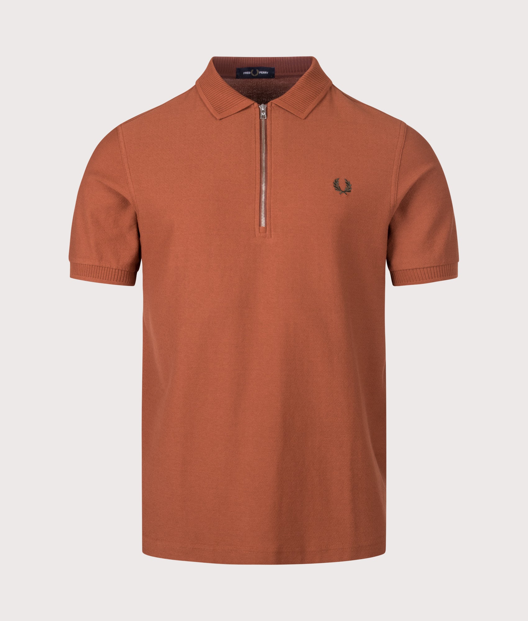 Fred Perry Regular Fit Crepe Piqué Polo Shirt in Brandy at EQVVS Menswear. Front shot.