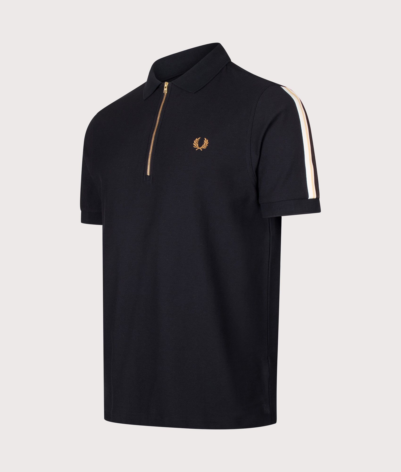 Fred Perry Regular Fit Zip Neck Tipped Tape Polo Shirt in Black at EQVVS Menswear. Angled front shot.