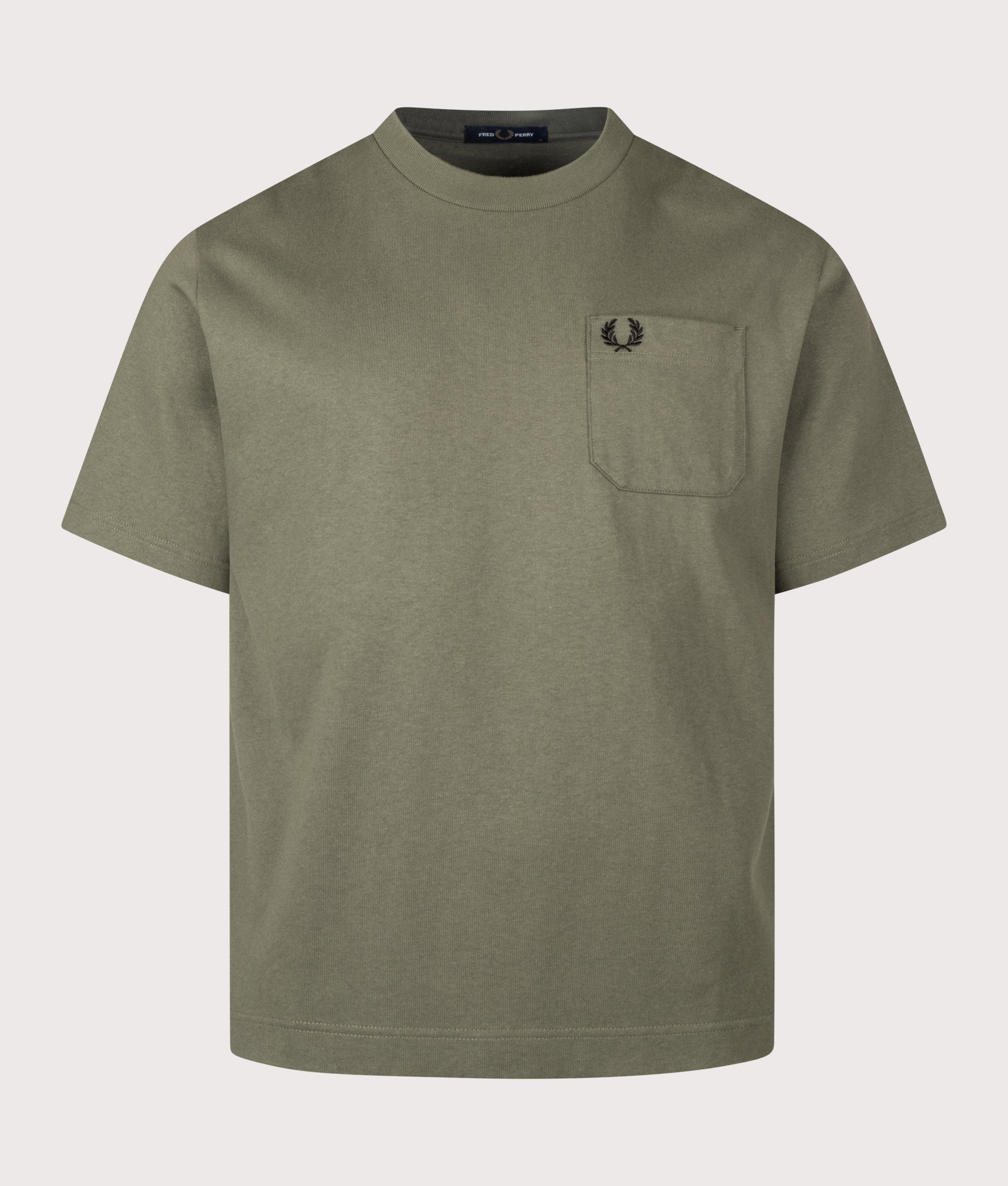 Fred Perry Relaxed Fit T-Shirt in Laurel Wreath Green at EQVVS Menswear. Front shot.