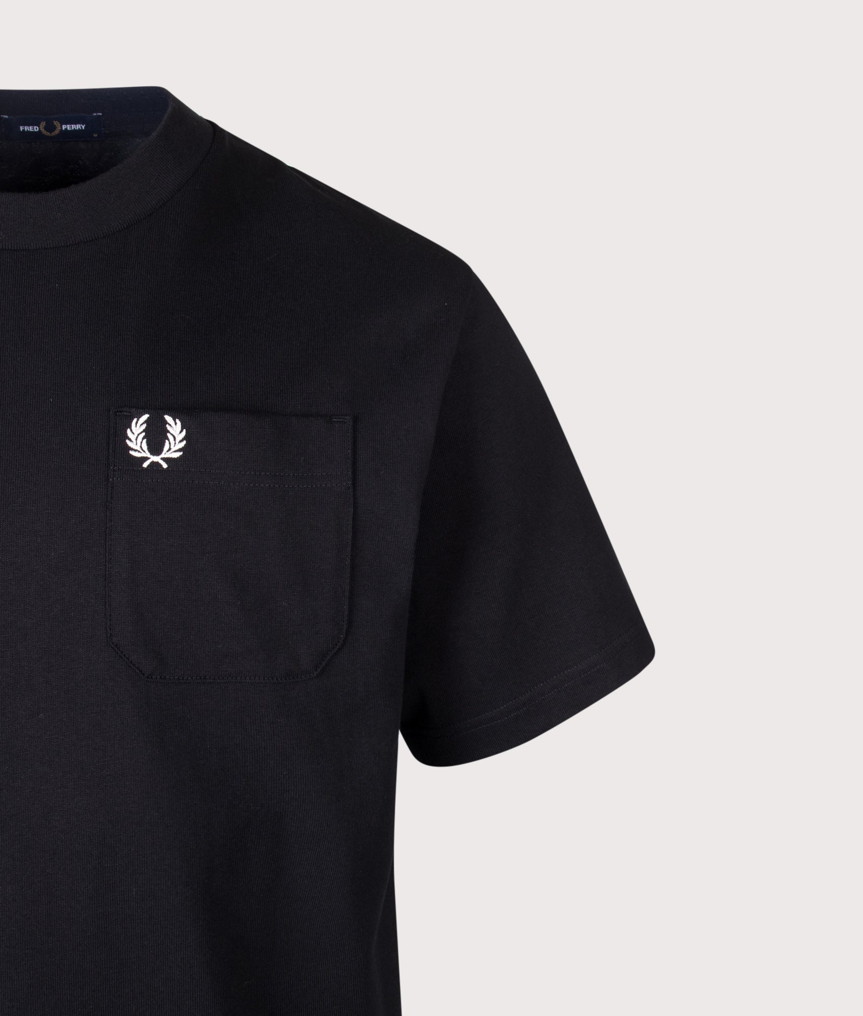Fred Perry Relaxed Fit T-Shirt in Black at EQVVS Menswear. Detail shot.