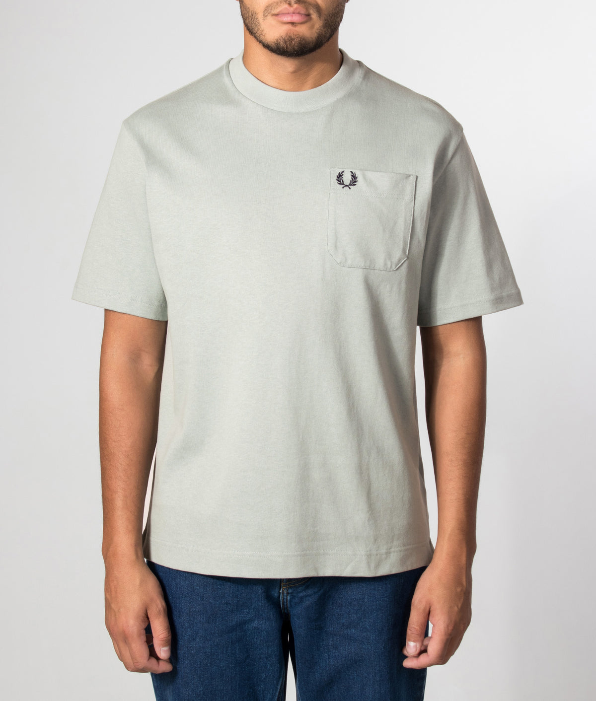Fred Perry Relaxed Fit T-Shirt in Silver Blue at EQVVS Menswear. Model front shot.