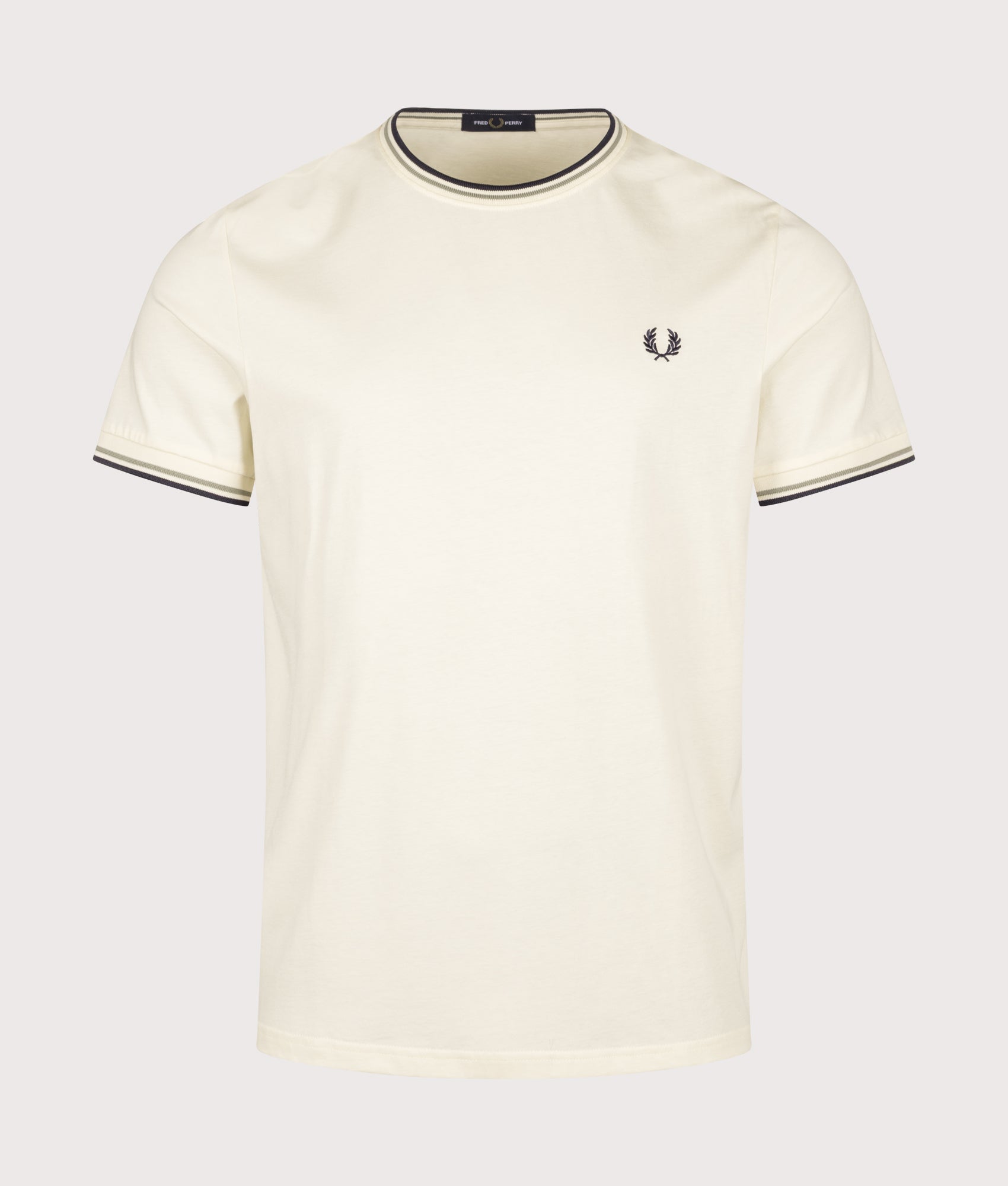 Fred Perry look, the Twin Tipped T-Shirt in Ecru, Seagrass and Dark Airforce at EQVVS Menswear. Front shot.