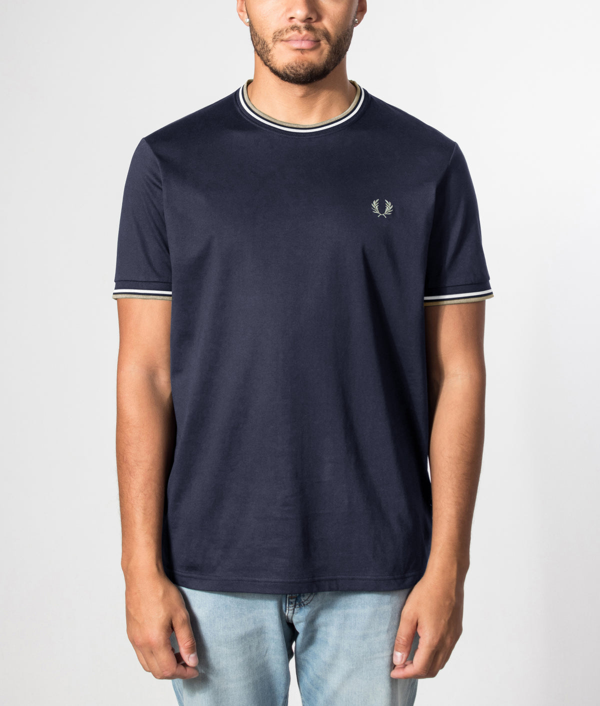 Fred Perry Regular Fit Twin Tipped T-Shirt in Dark Airforce, Ecru and Seagrass at EQVVS Menswear. Front model shot.