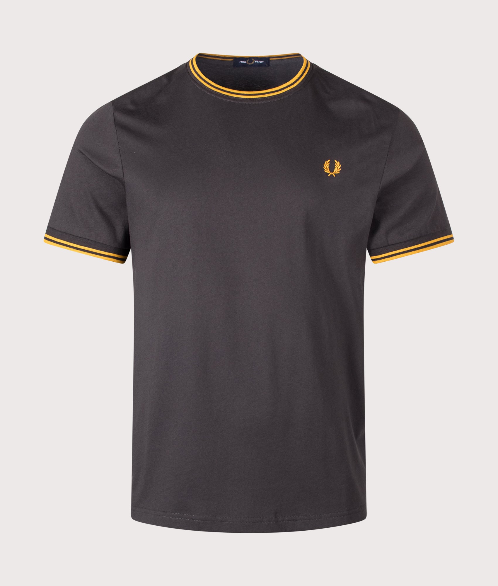 Fred Perry Regular Fit Twin Tipped T-Shirt in Anchor Grey and Golden at EQVVS Menswear. Front shot.