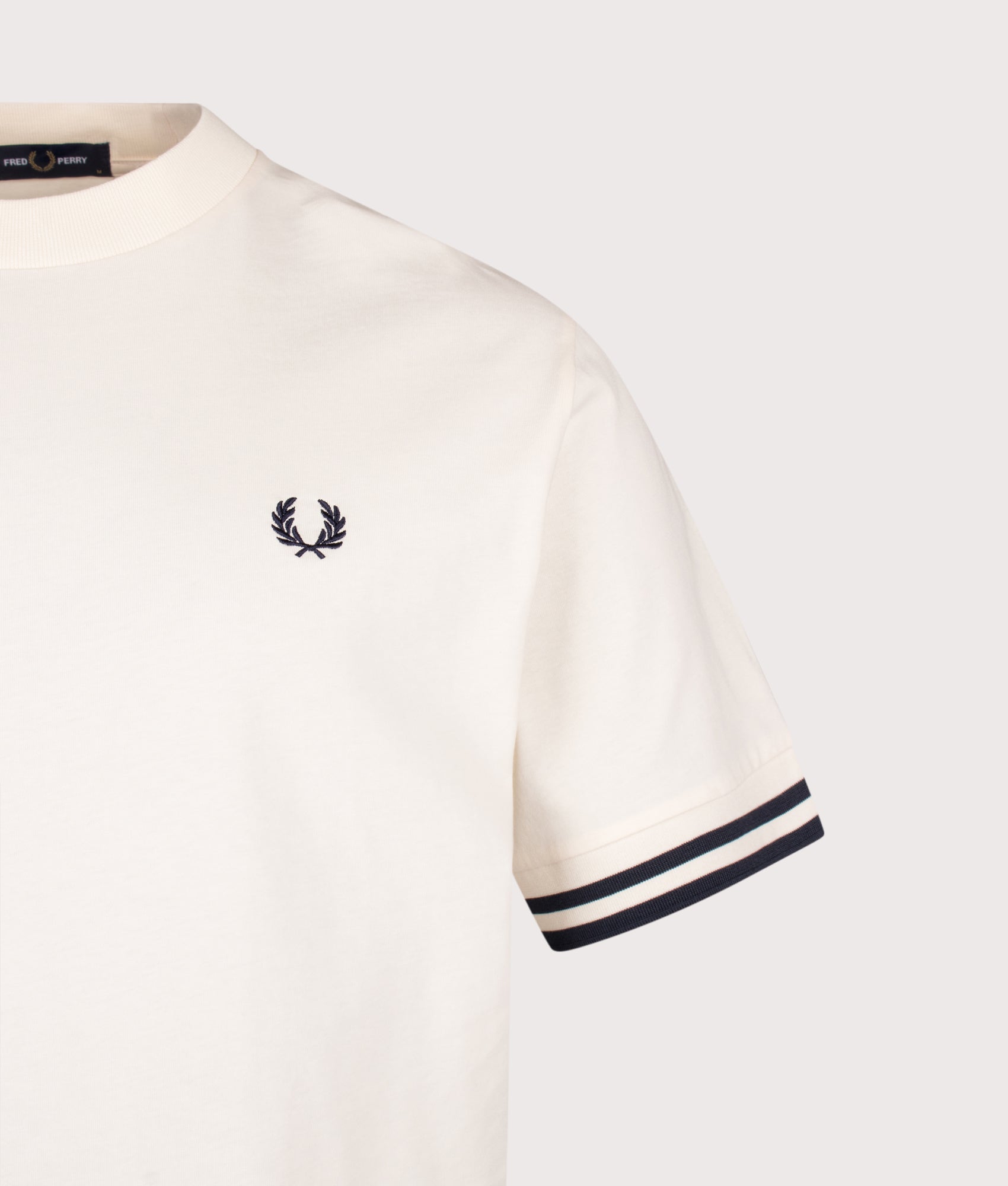 Fred Perry Relaxed Fit Bold Tipped T-Shirt in Ecru at EQVVS Menswear. Detail shot.