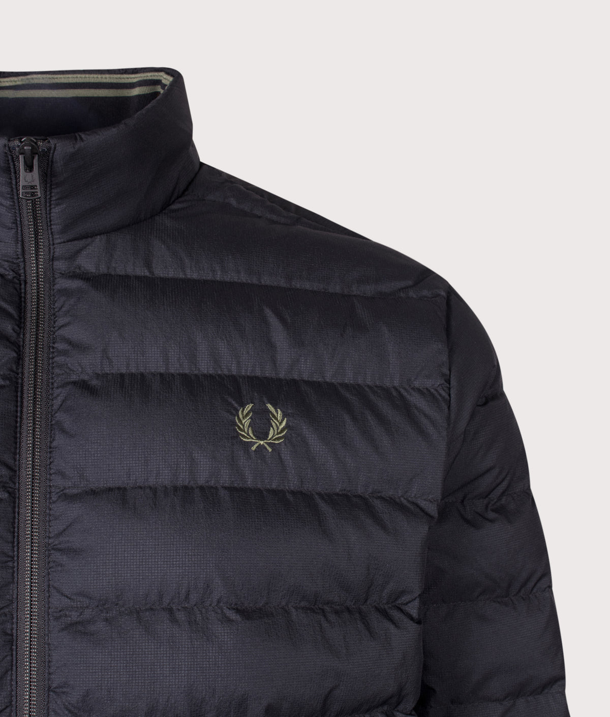 Fred Perry Regular Fit Insulated Jacket in Black at EQVVS Menswear. Detail shot.