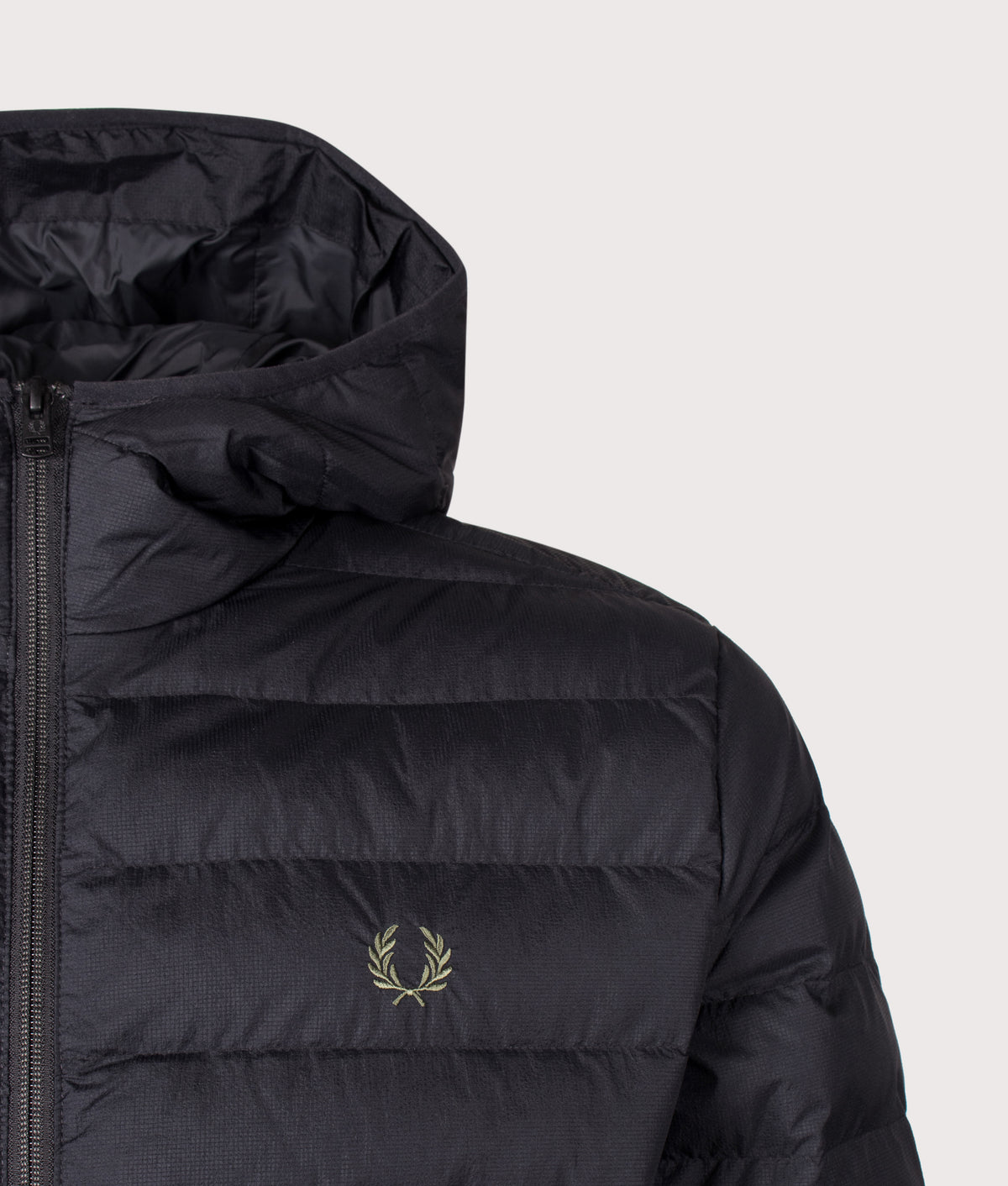 Fred Perry Regular Fit Hooded Insulated Jacket in Black at EQVVS Menswear. Detail shot.