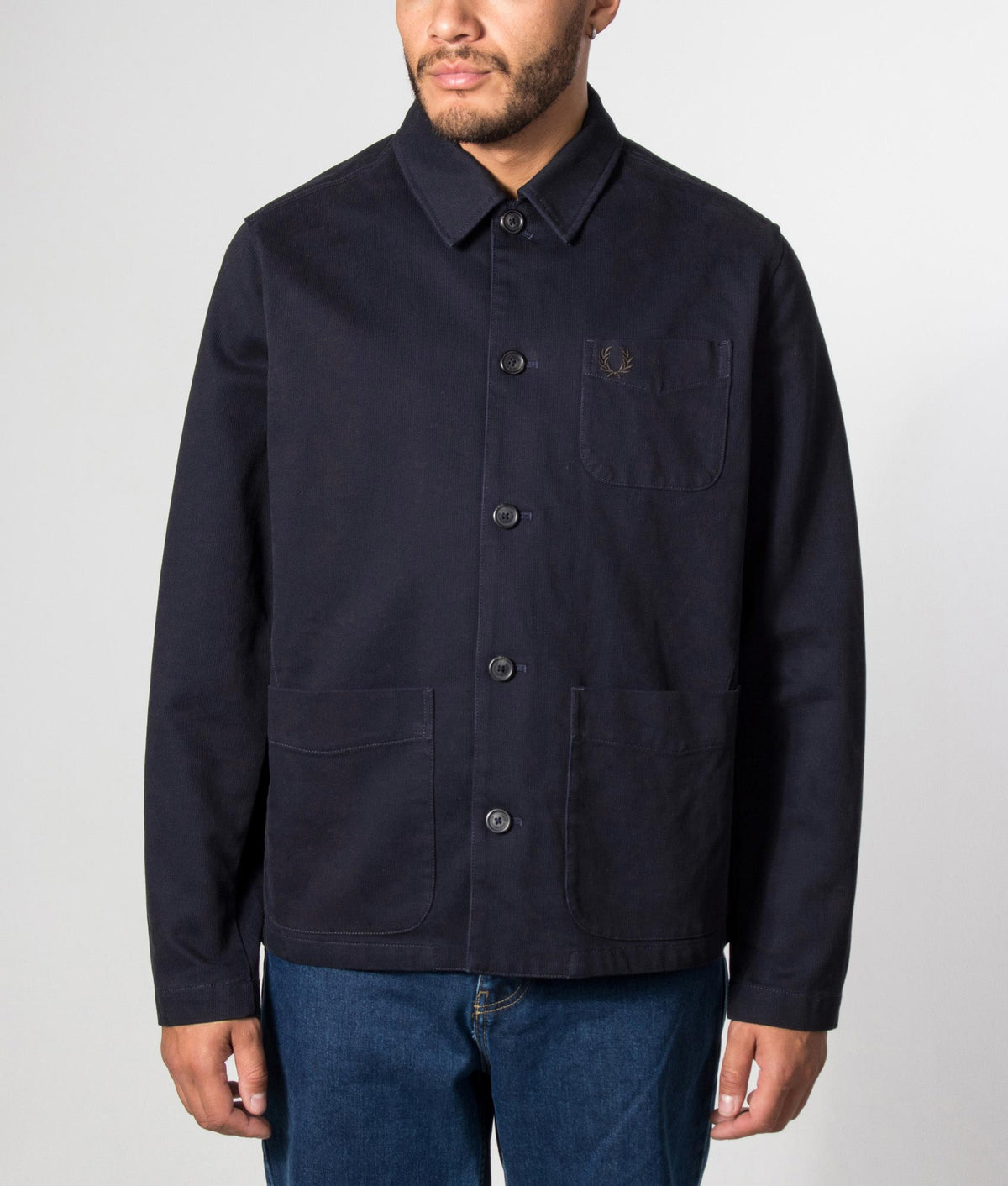 Fred Perry Regular Fit Bedford Cord Overshirt in Navy at EQVVS Menswear. Model front shot.
