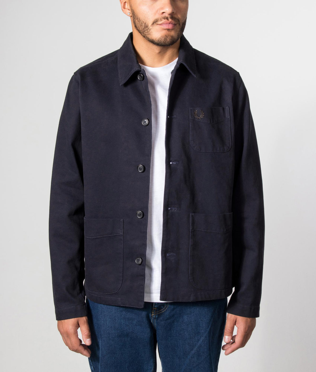 Fred Perry Regular Fit Bedford Cord Overshirt in Navy at EQVVS Menswear. Model front shot.